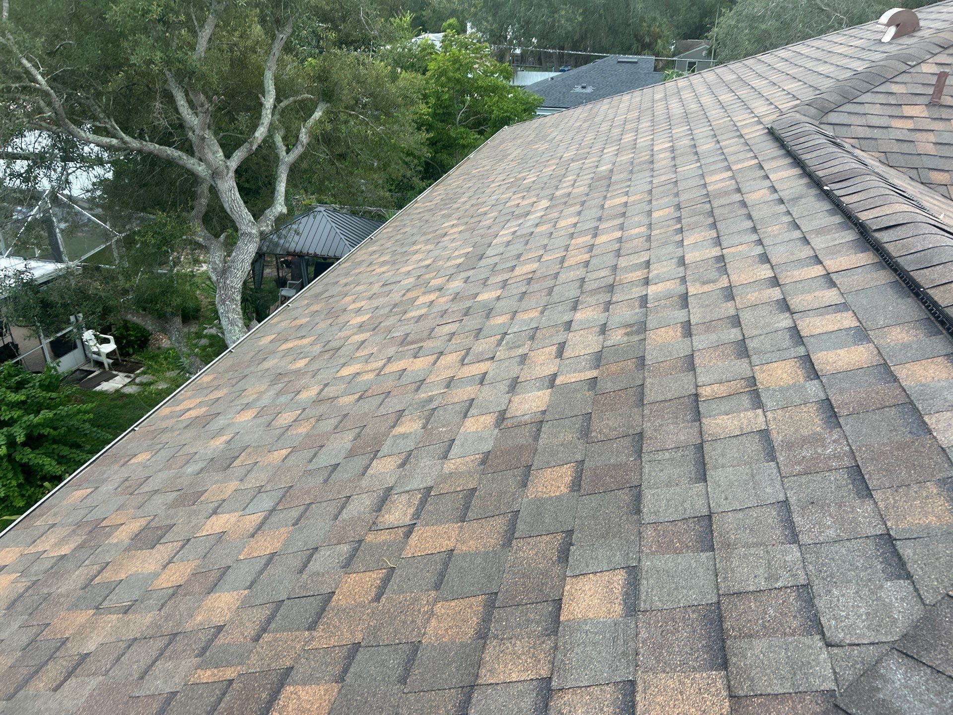 Deltona Roof Replacement Featuring Copper Canyon Shingles and Decking Repair by Pinnacle Roofing Group