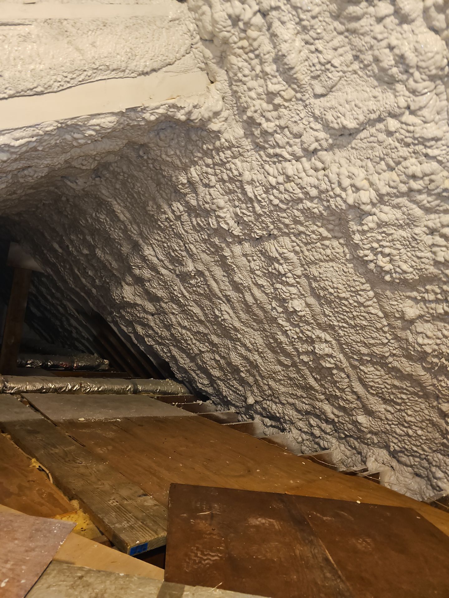 Attic Retrofit using open cell spray foam by NYS Foam & Energy