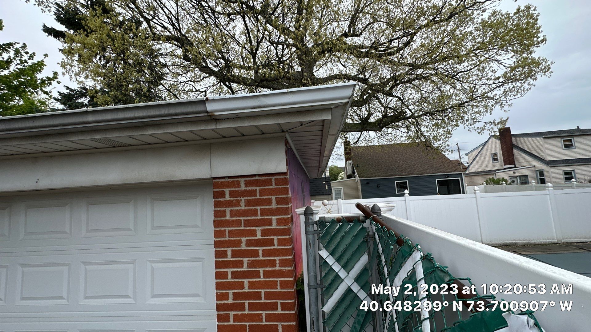 Gutter Installation using 5"white K style seamless gutters and 2x3 white leaders by Above All Gutters 