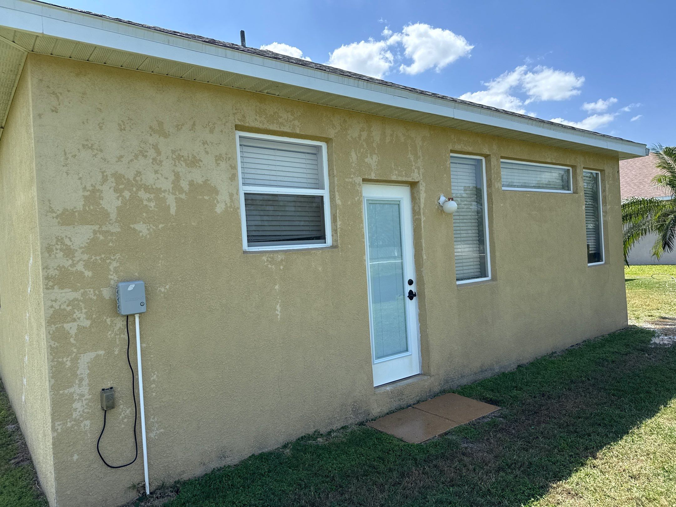 Driveway & Rear Wall Soft Wash | Lexington Community | Parrish, FL | Sunshine AquaWash by Sunshine AquaWash