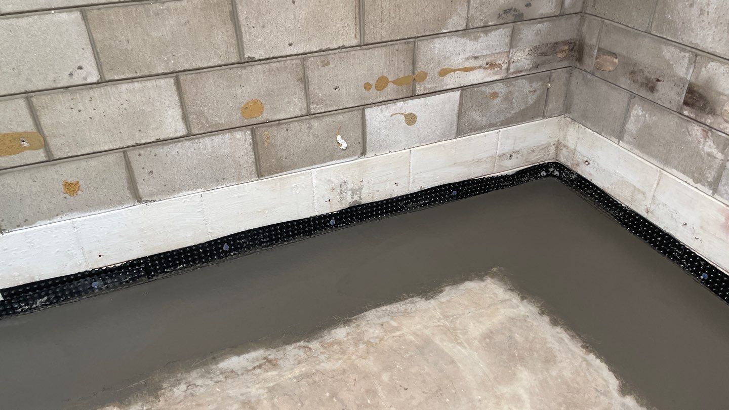 Interior Drain Tile & Sump System in St. Paul, MN by Waterproofing Northeast