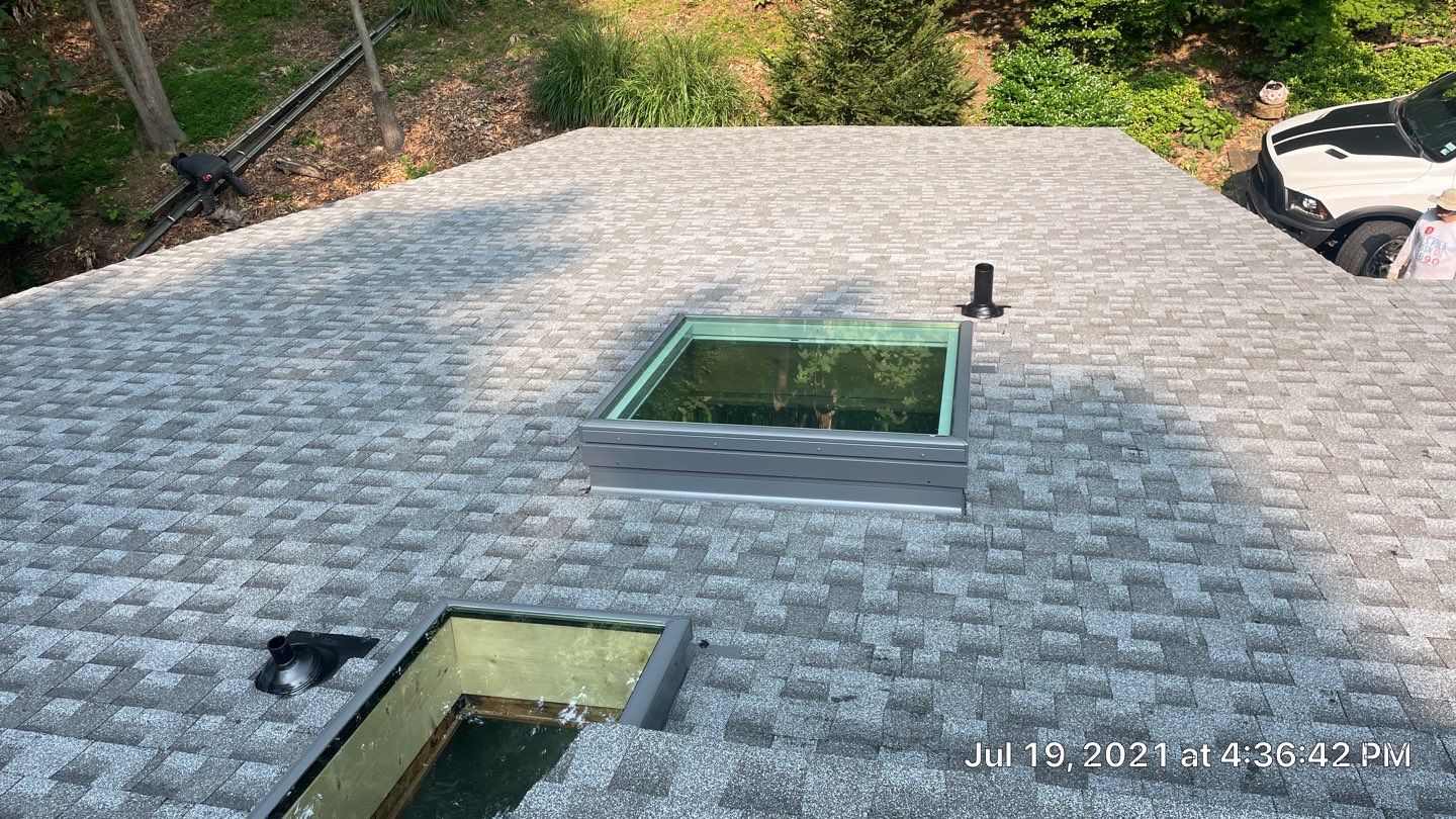Deckhouse Roof Replacement by American Home Contractors
