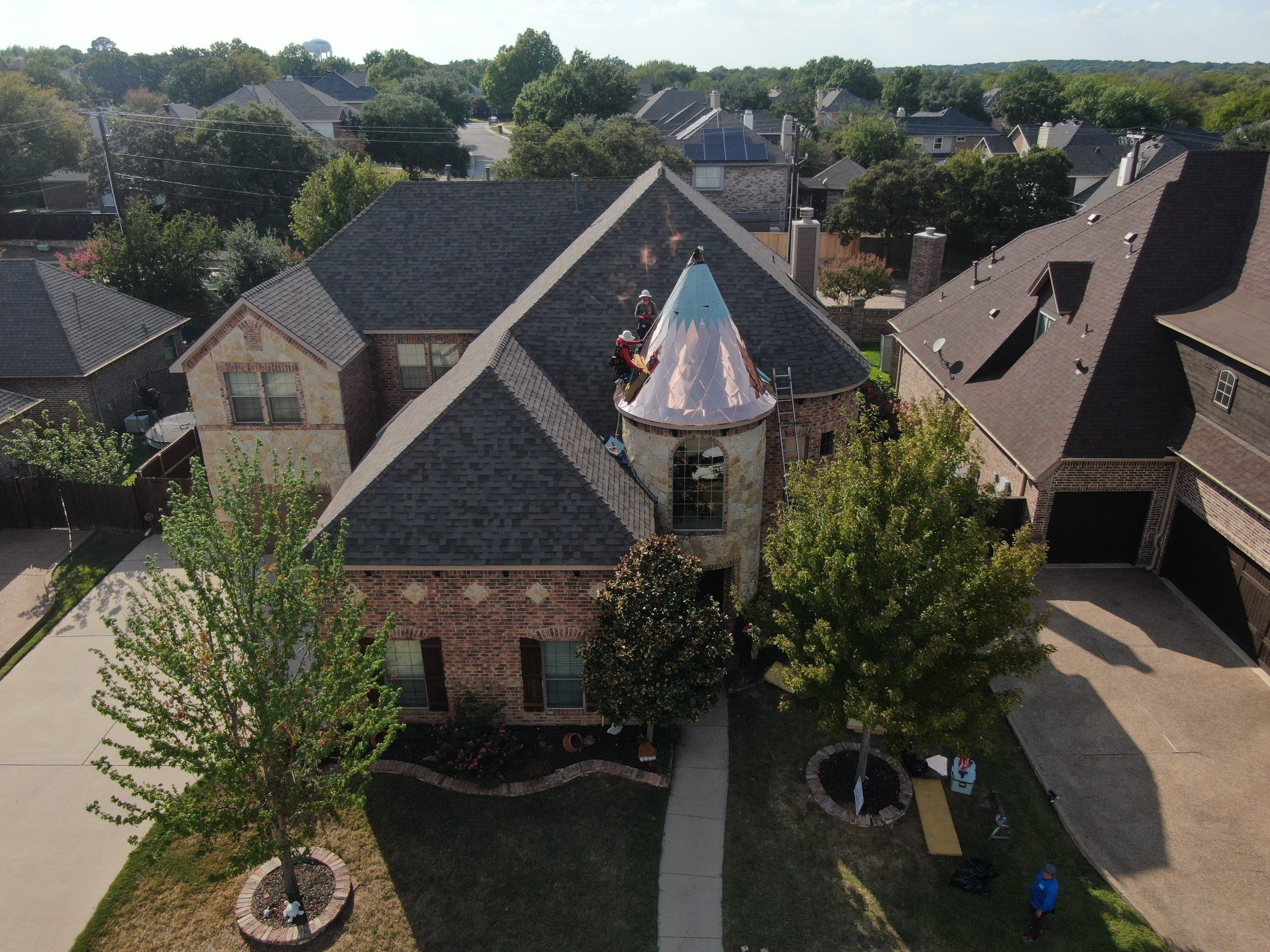 Installing Custom copper turret and Malarkey Vista Class 4 shingles Hail Damage Upgrade by Becker Roofing and Exteriors