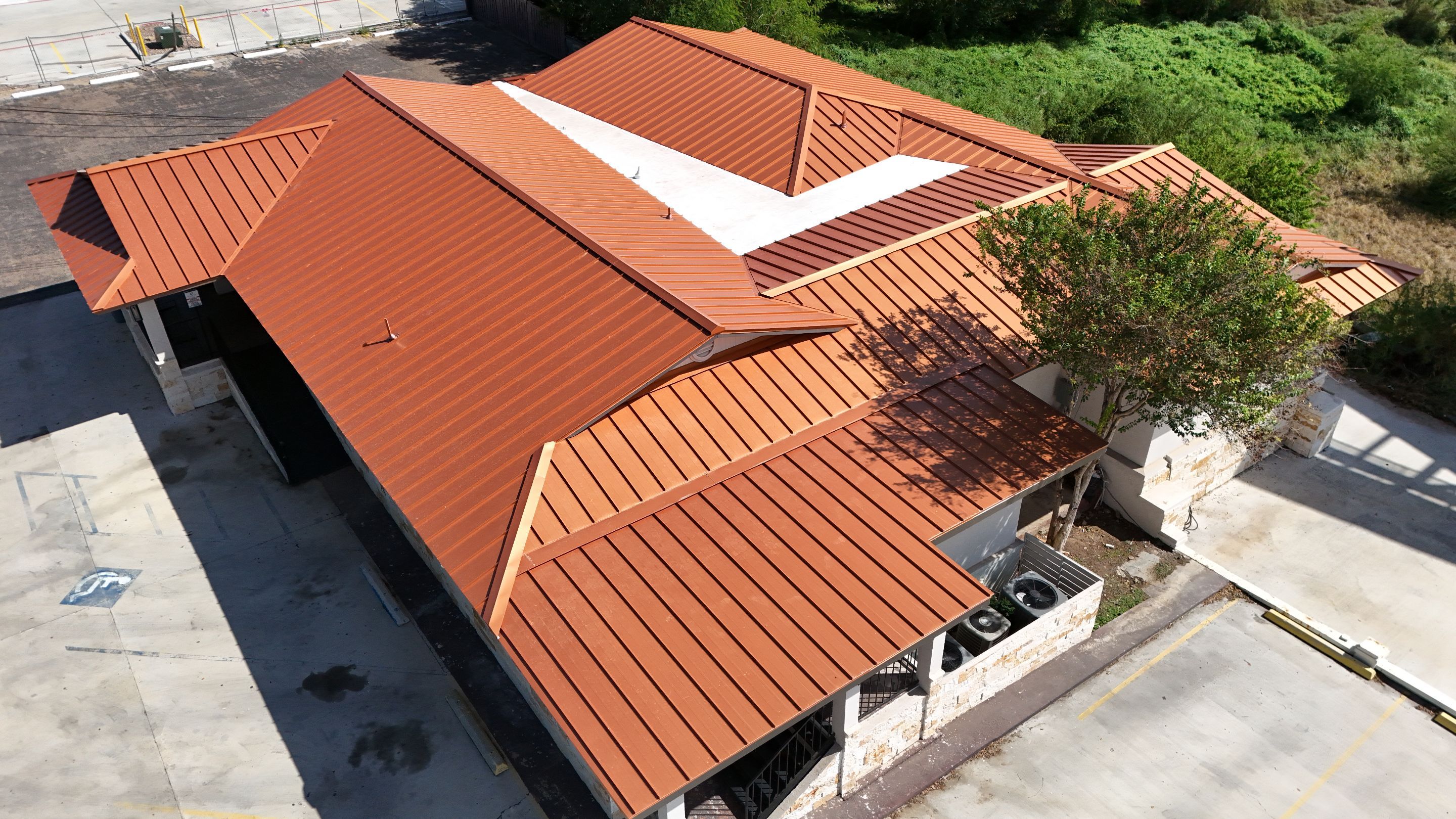 Copper Standing Seam Metal Roof Installation for Laredo Medical Clinic by JM Flores Roofing & Construction, Inc