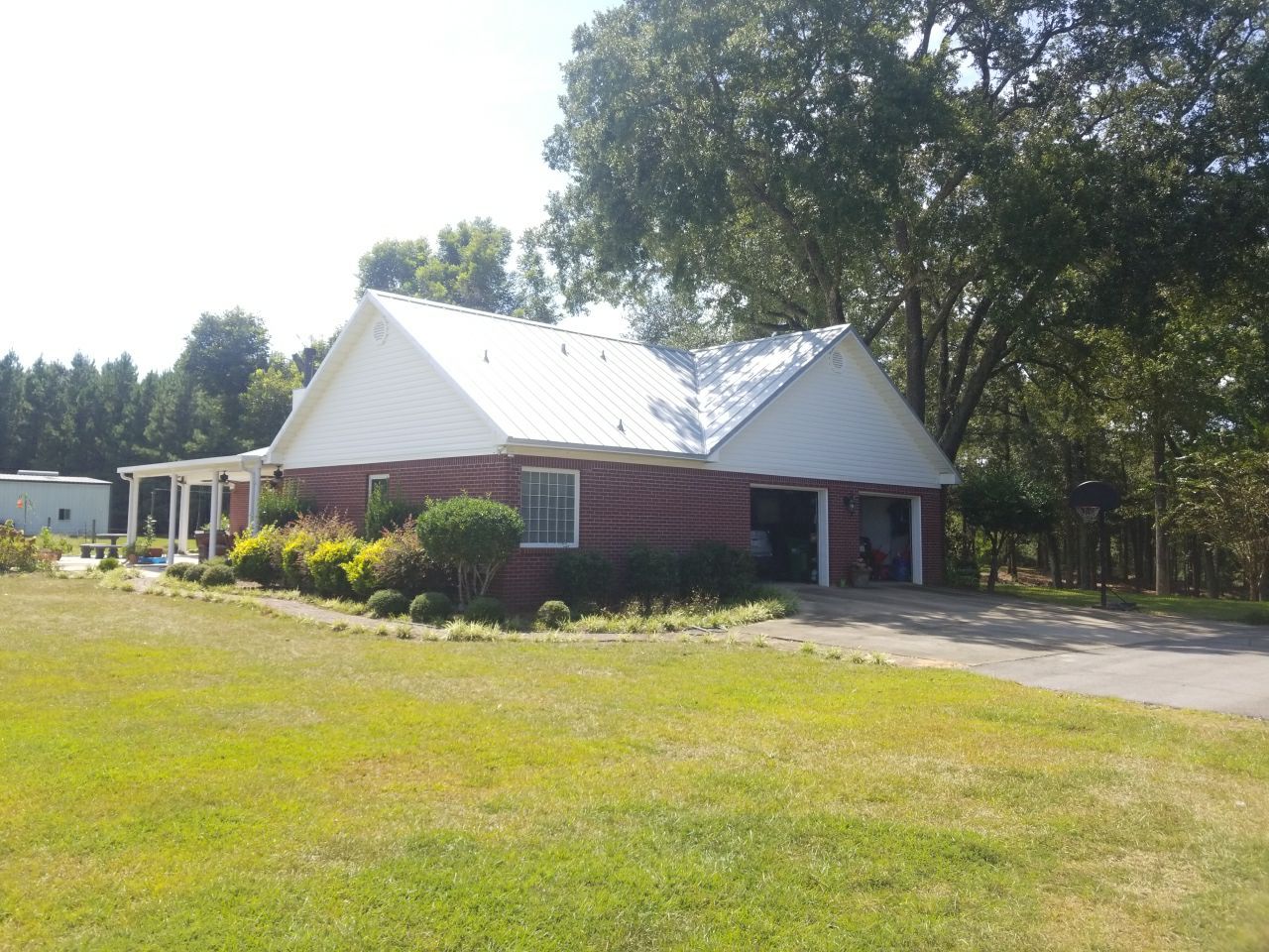 Residential Roofing Installation using Metal roofing by American Roofing & Construction LLC