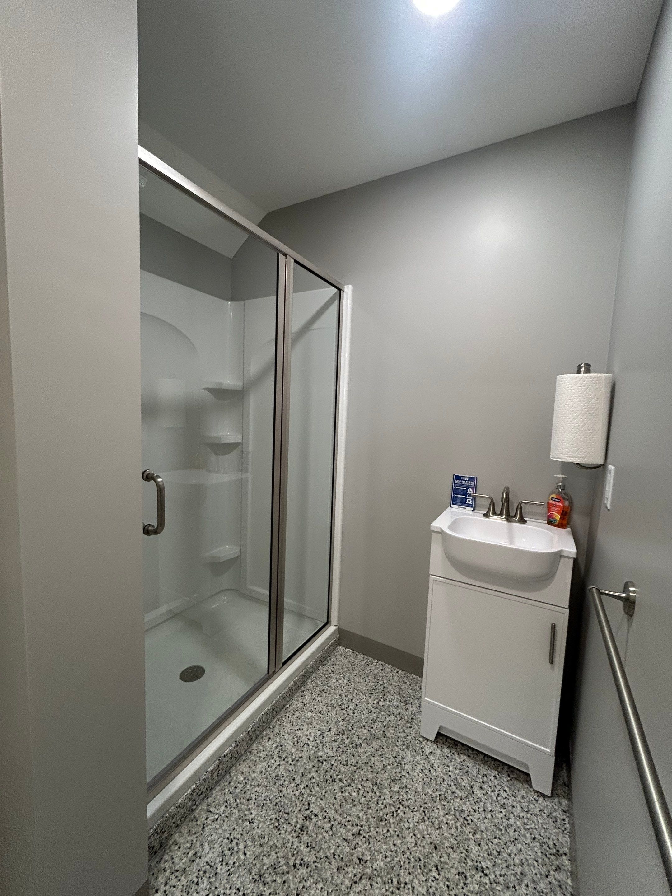 Two Showers using Alumax Shower by Cheshire Glass Company