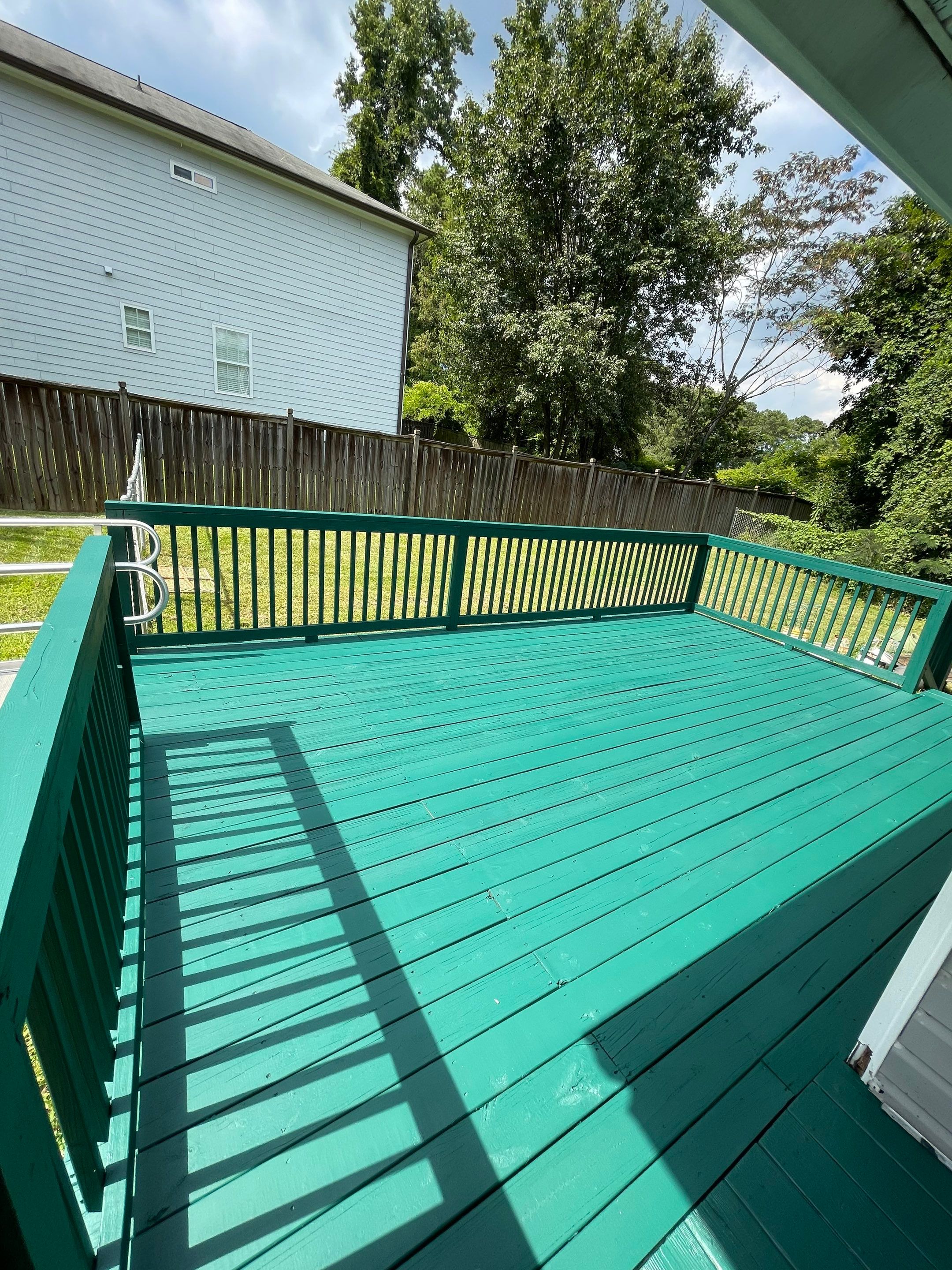 Deck Refinishing and Exterior Painting with Custom Green Finish in Decatur by Swift Home Renovations