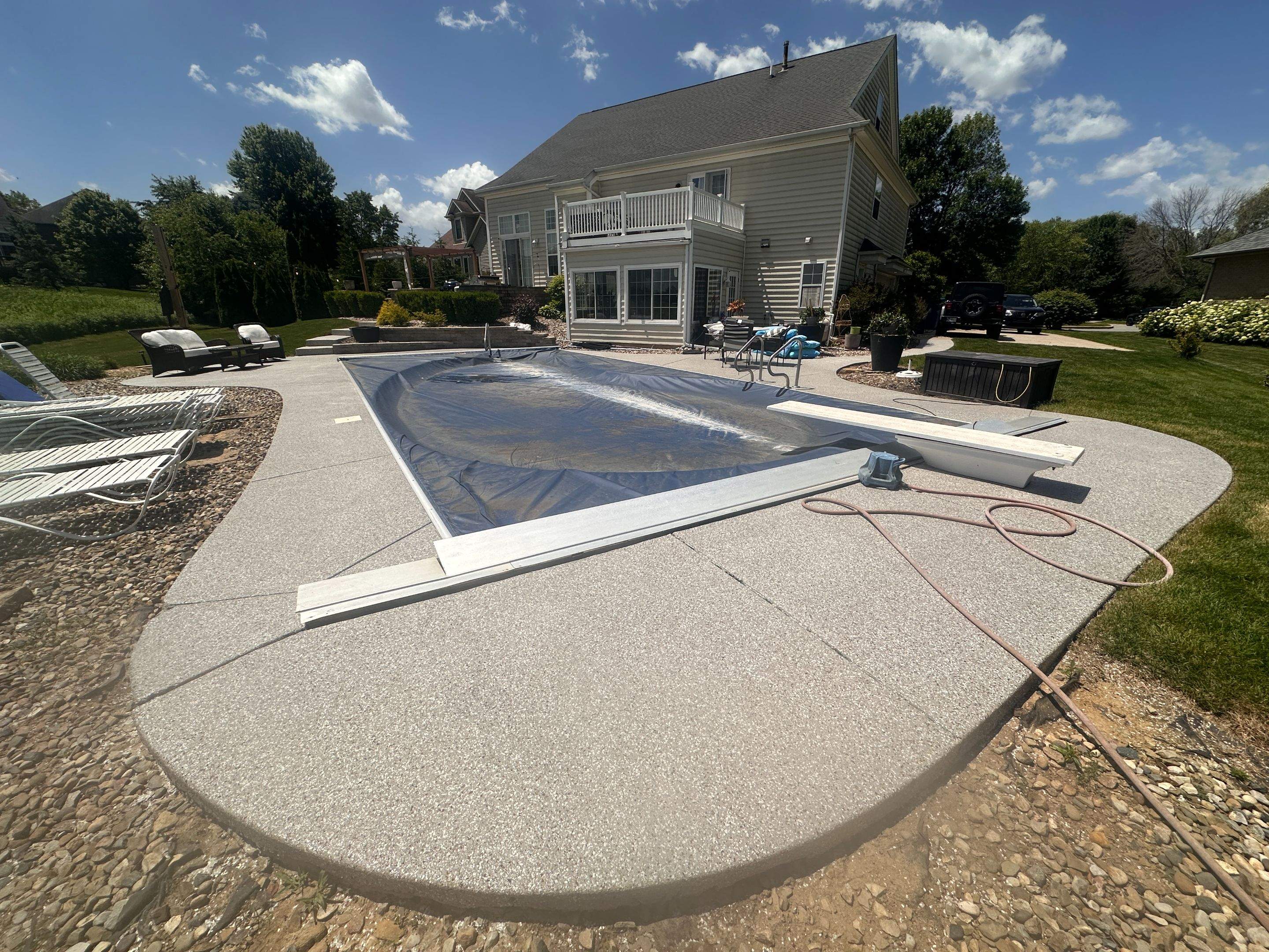Creekbed Pool Deck Coating by Level 10 Coatings