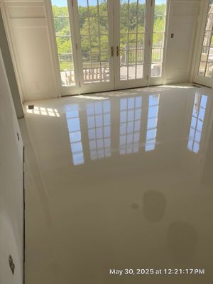Paint the brand new maple floor...WHITE! Designer-driven project is a showstopper!