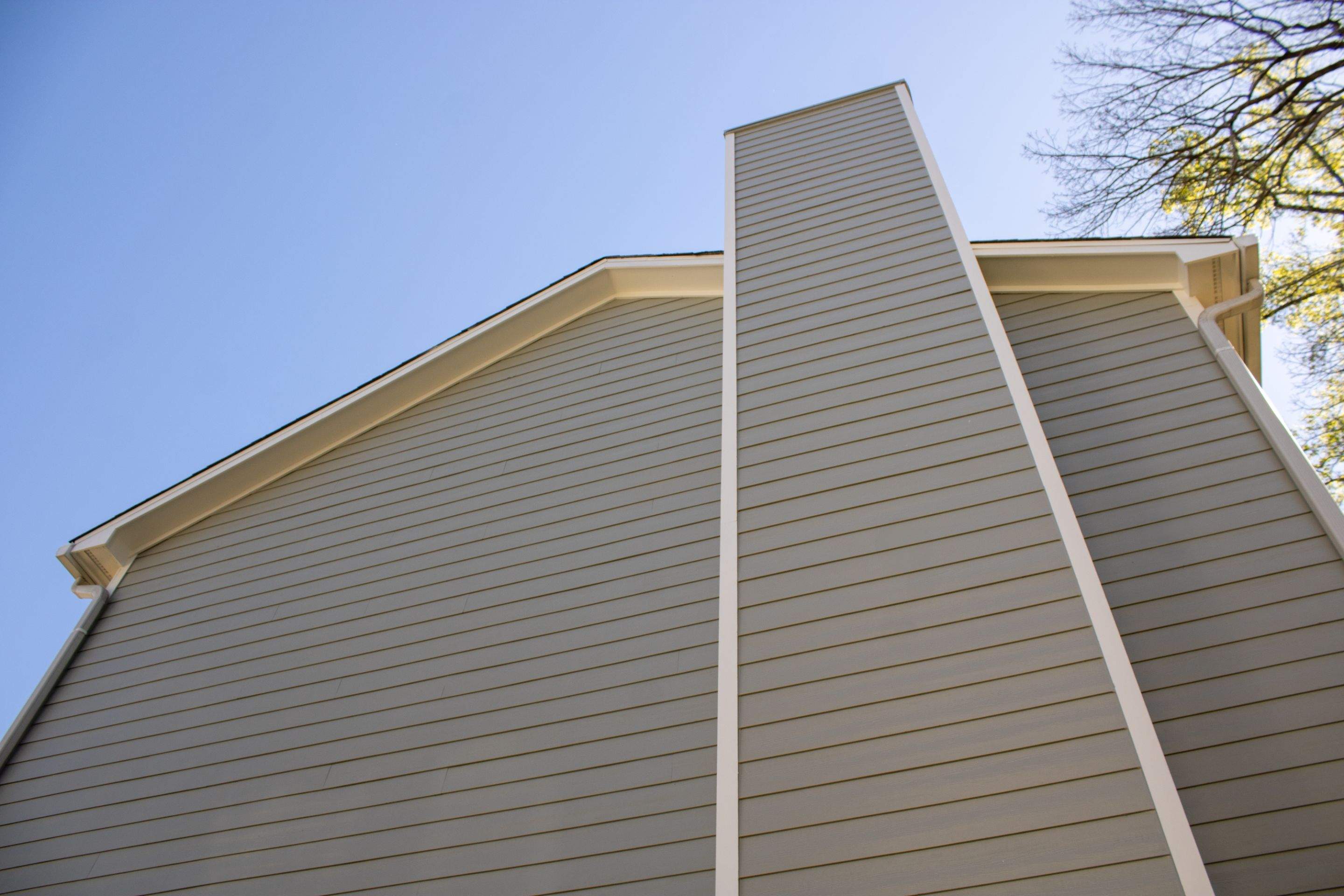 James Hardie Siding Replacement and Pressure Treated Pine Deck Resurface by Nelson Exteriors