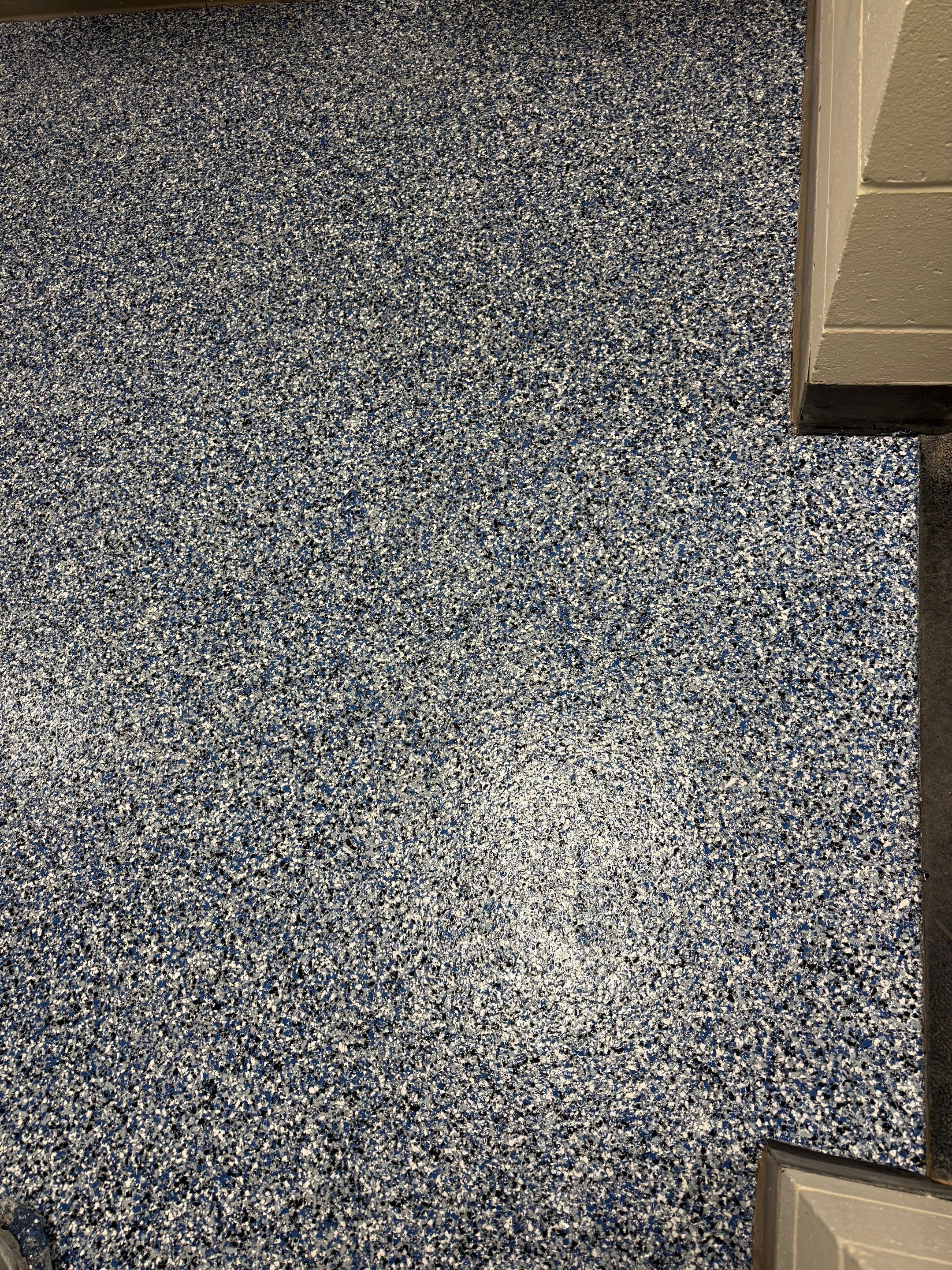 Seamless Epoxy Floor Coating at the Sioux Falls Canaries Facility by Select Painting, Coatings & Garage Cabinets