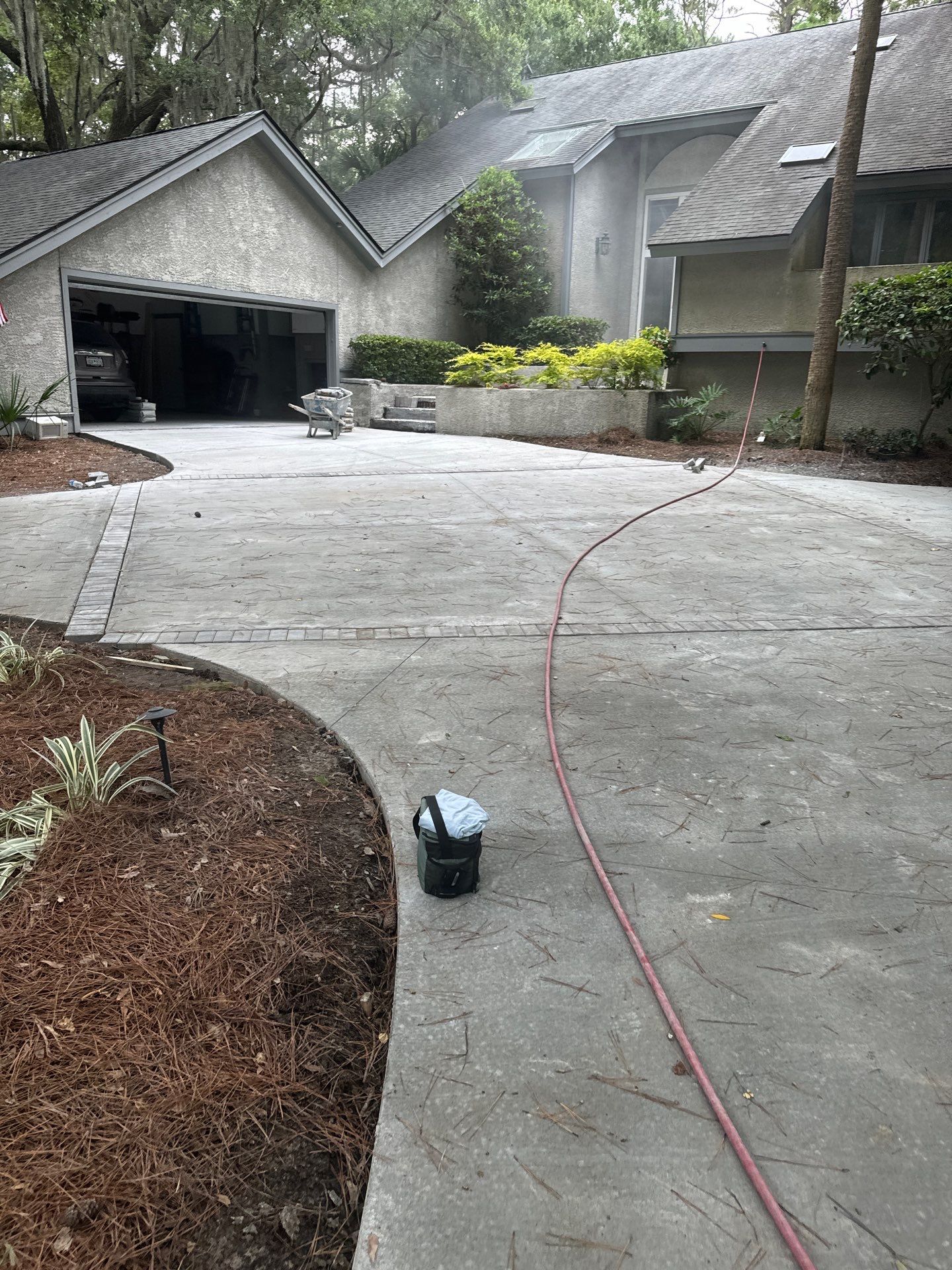 Hilton Head Island Concrete Driveway Replacement with Decorative Paver Borders by Lowcountry Scapes, LLC