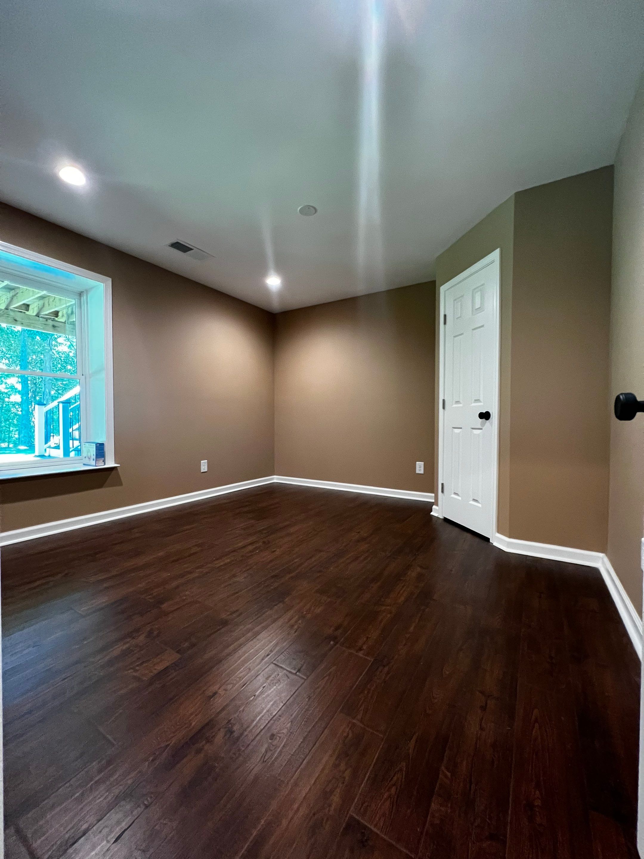 Custom Basement Remodeling With Home Theater and Bar in Woodstock by Swift Home Renovations