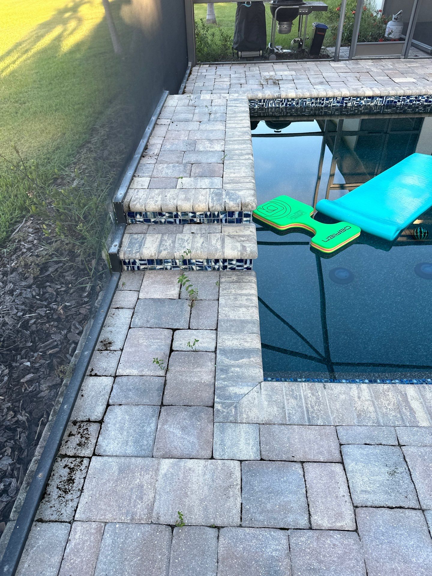 Paver Driveway, Sidewalk, and Pool Deck Cleaning in Winding River Community, Bradenton, FL by Sunshine AquaWash