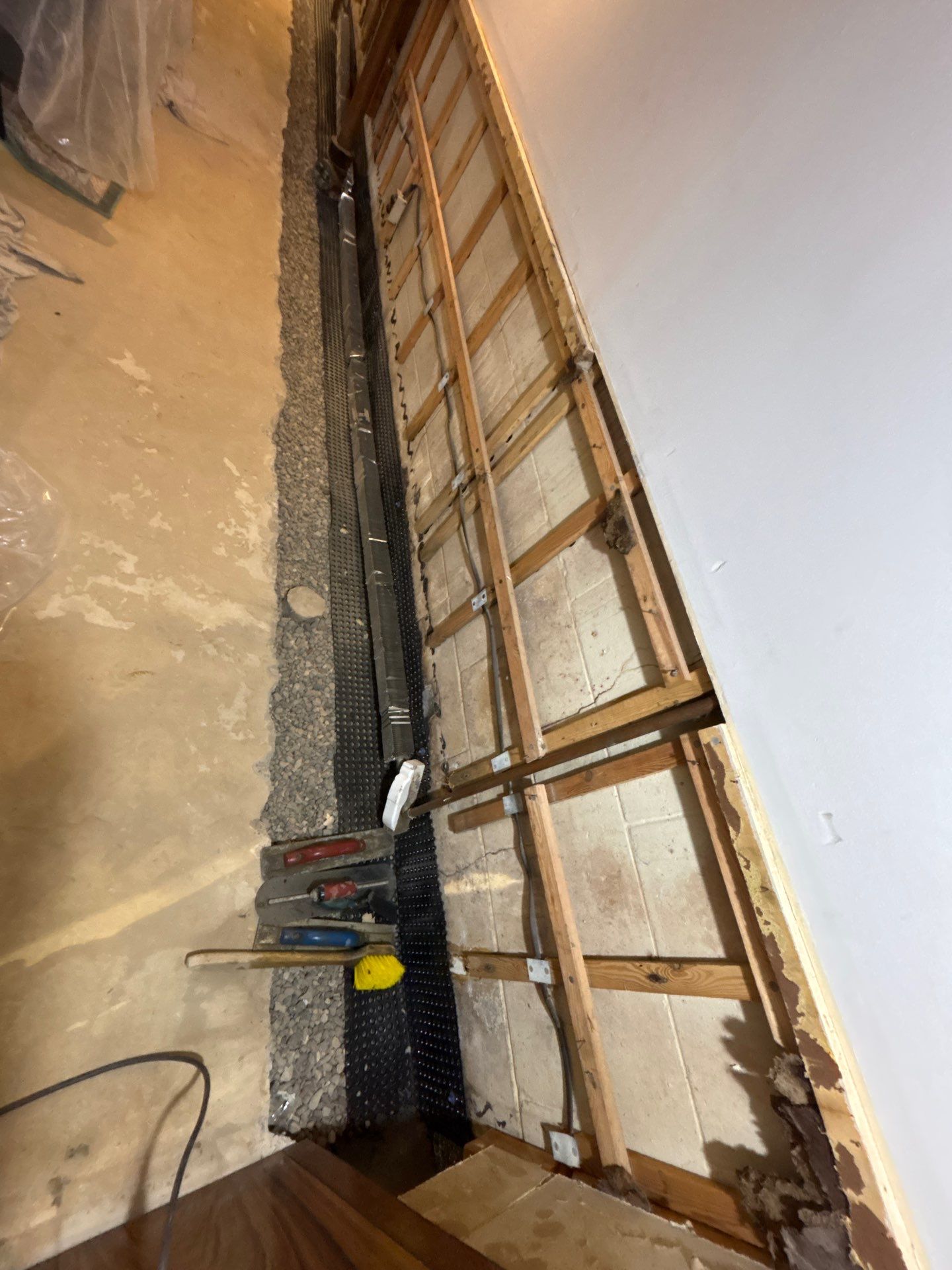 Drain Tile, Sump Pump & Buried Discharge in Columbia Heights by Waterproofing Northeast