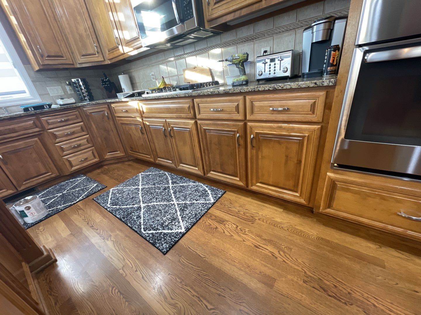 Painting Hardwood using Sherwin Williams paint by Lightning Exteriors