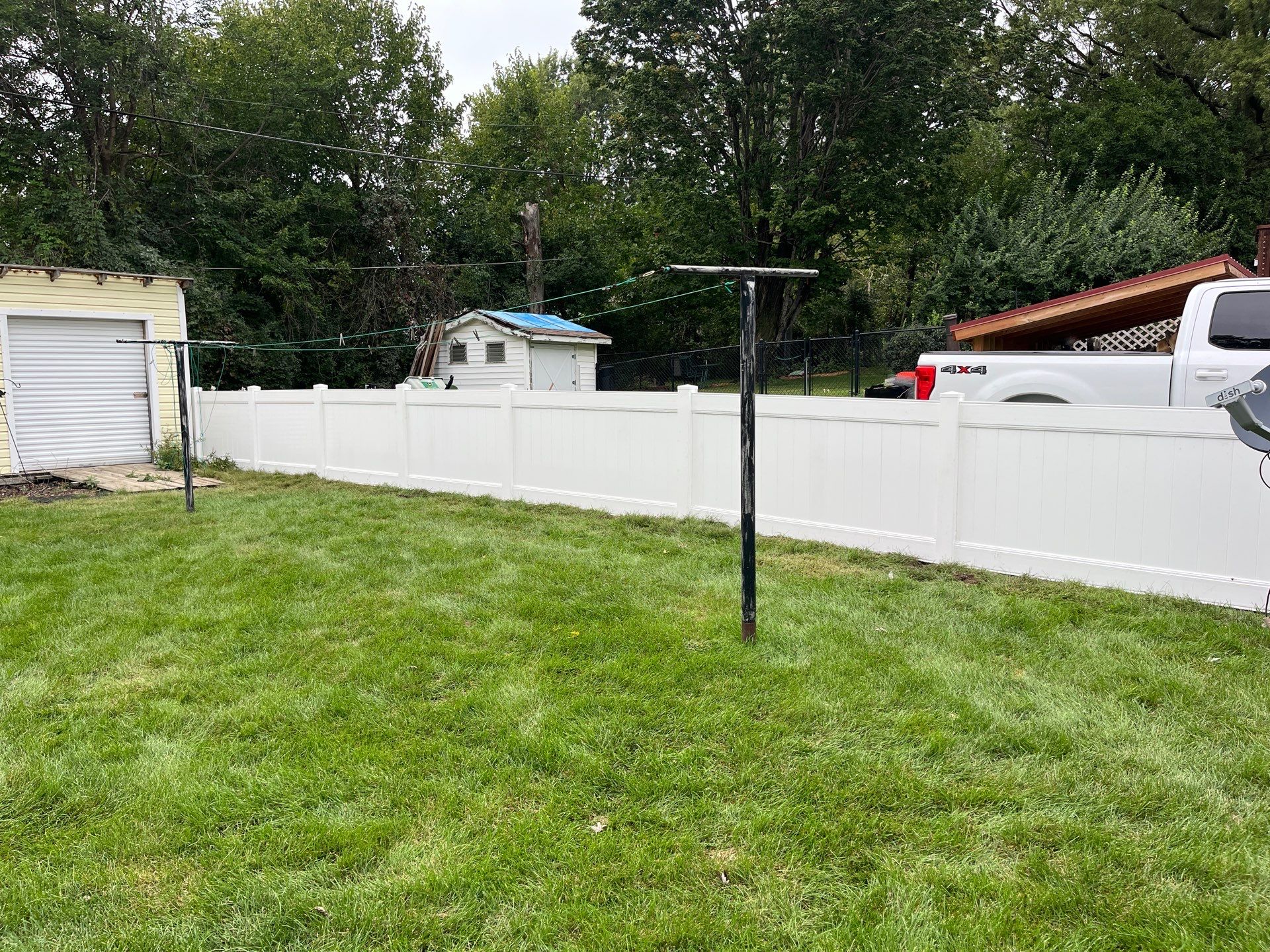 New White Vinyl Privacy Fence and Gate Installation in Waterloo by Perfect Picket Fence and Stain
