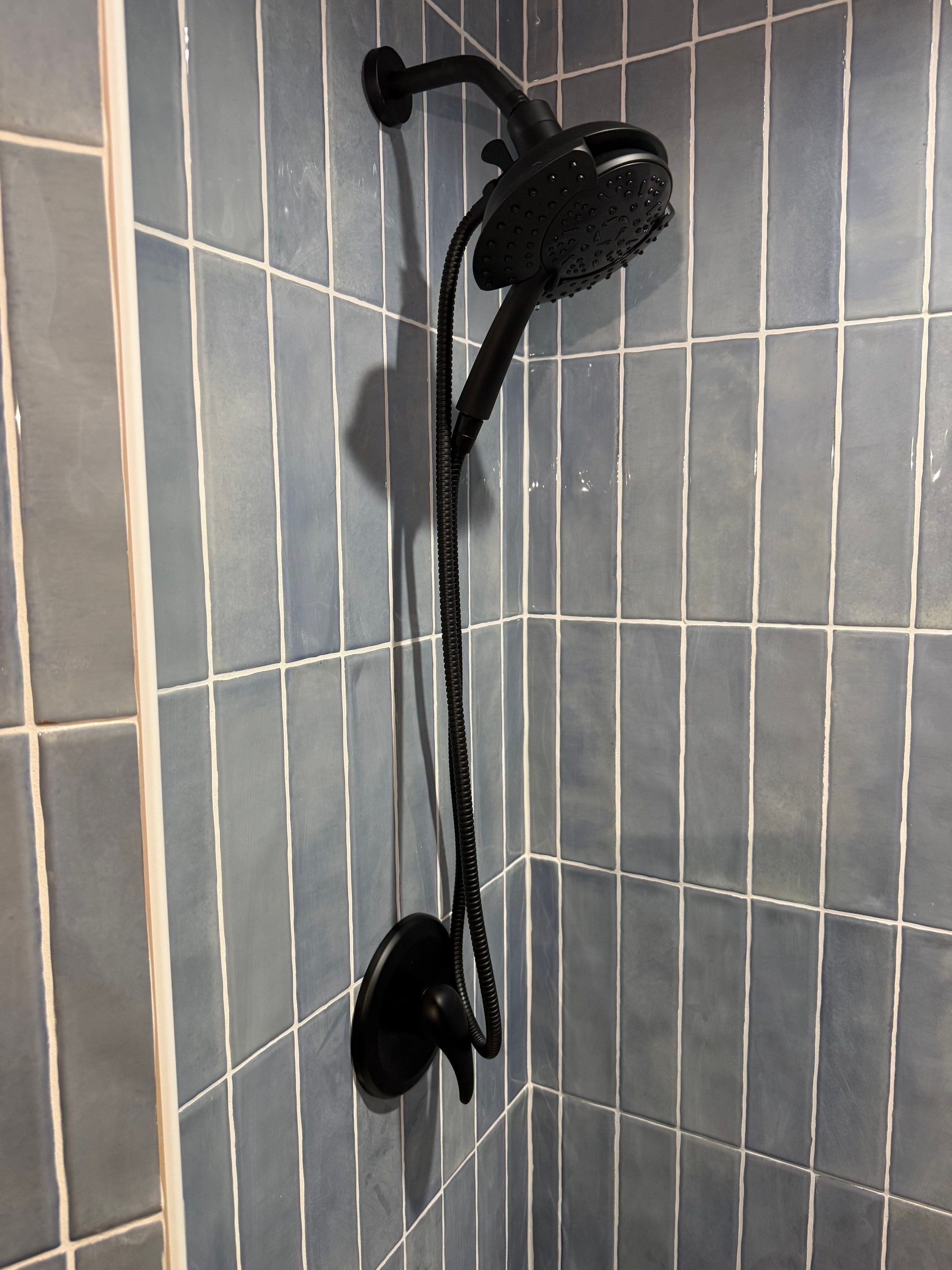 Tile shower and floor by Footprints Floors of Nashville