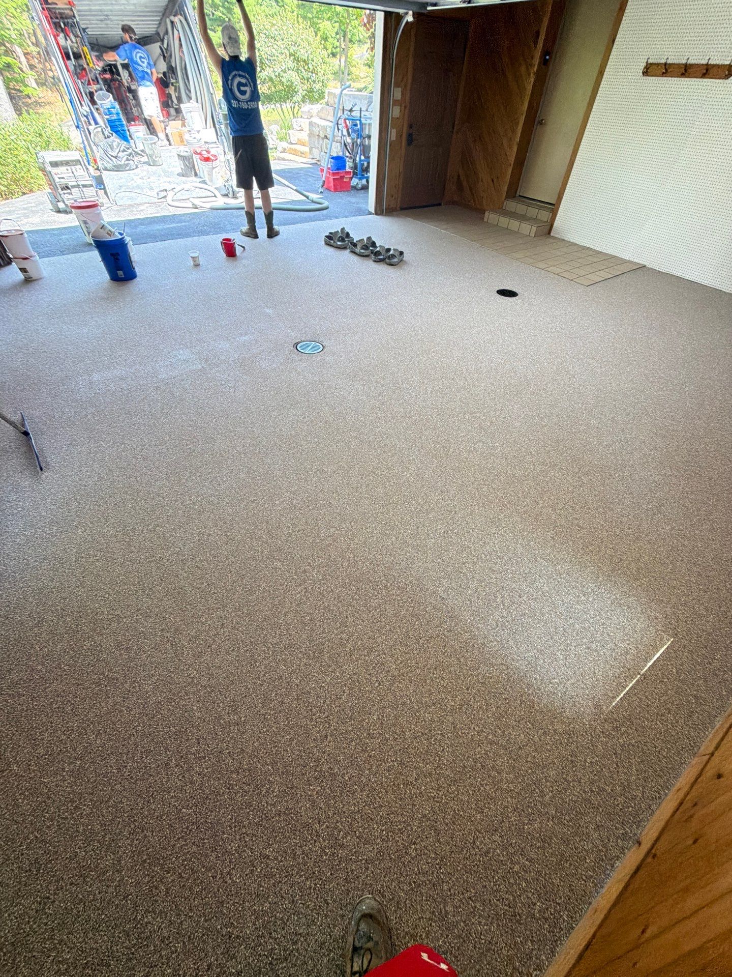 Grand Haven Garage Epoxy Floor Coating with Wax Wing Flake by Gordon Painting