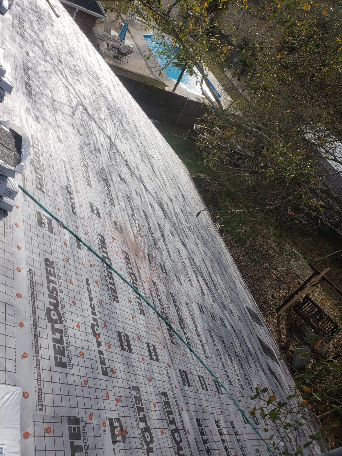 Residential Roofing Installation using Roof Replacement by American Roofing & Construction LLC