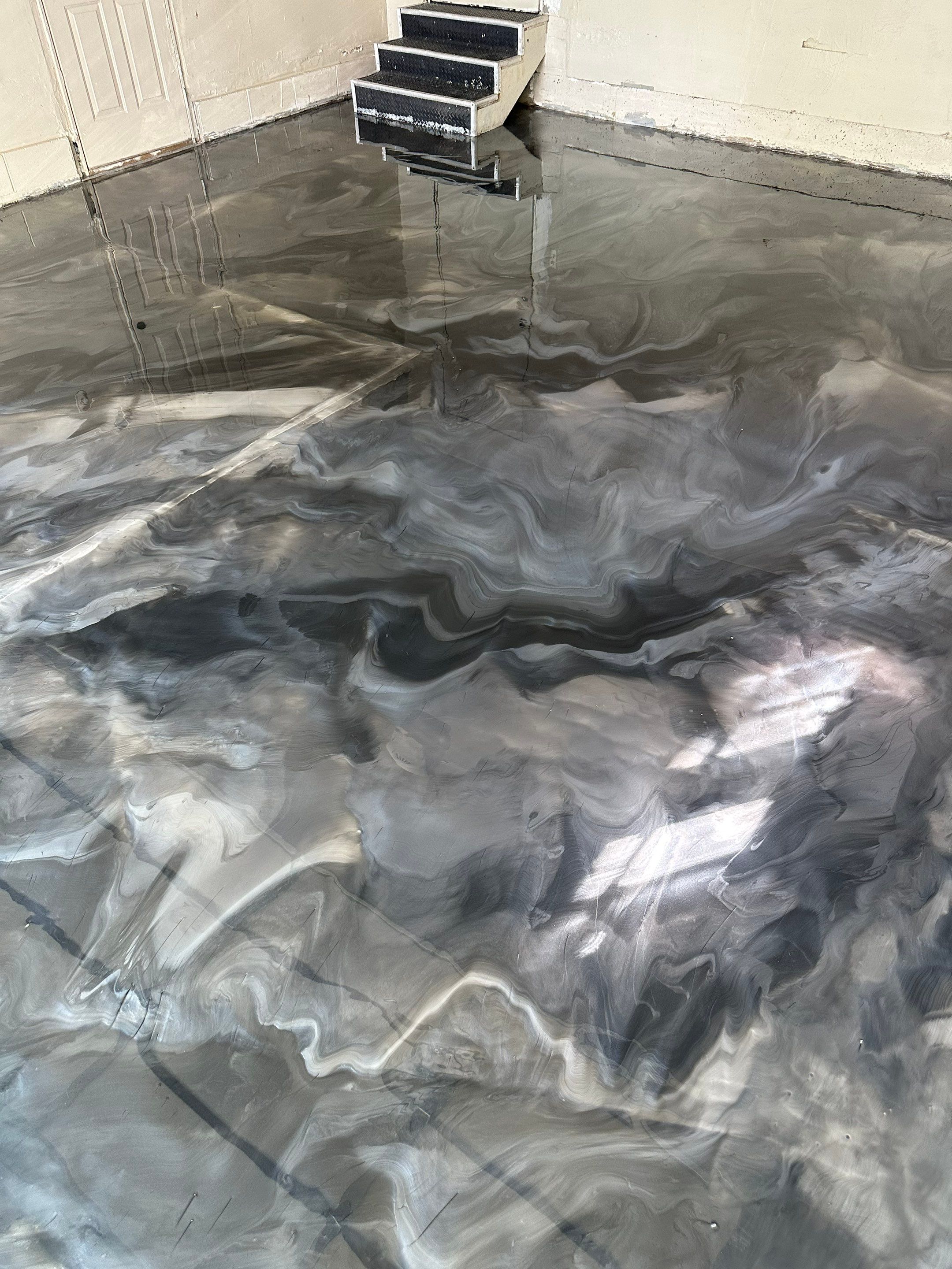 High-Gloss Metallic Epoxy Garage Floor Transformation in Lincoln by Goat Coatings