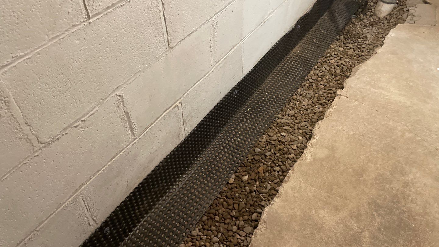Drain Tile & Sump Pump Installation in South Minneapolis by Waterproofing Northeast