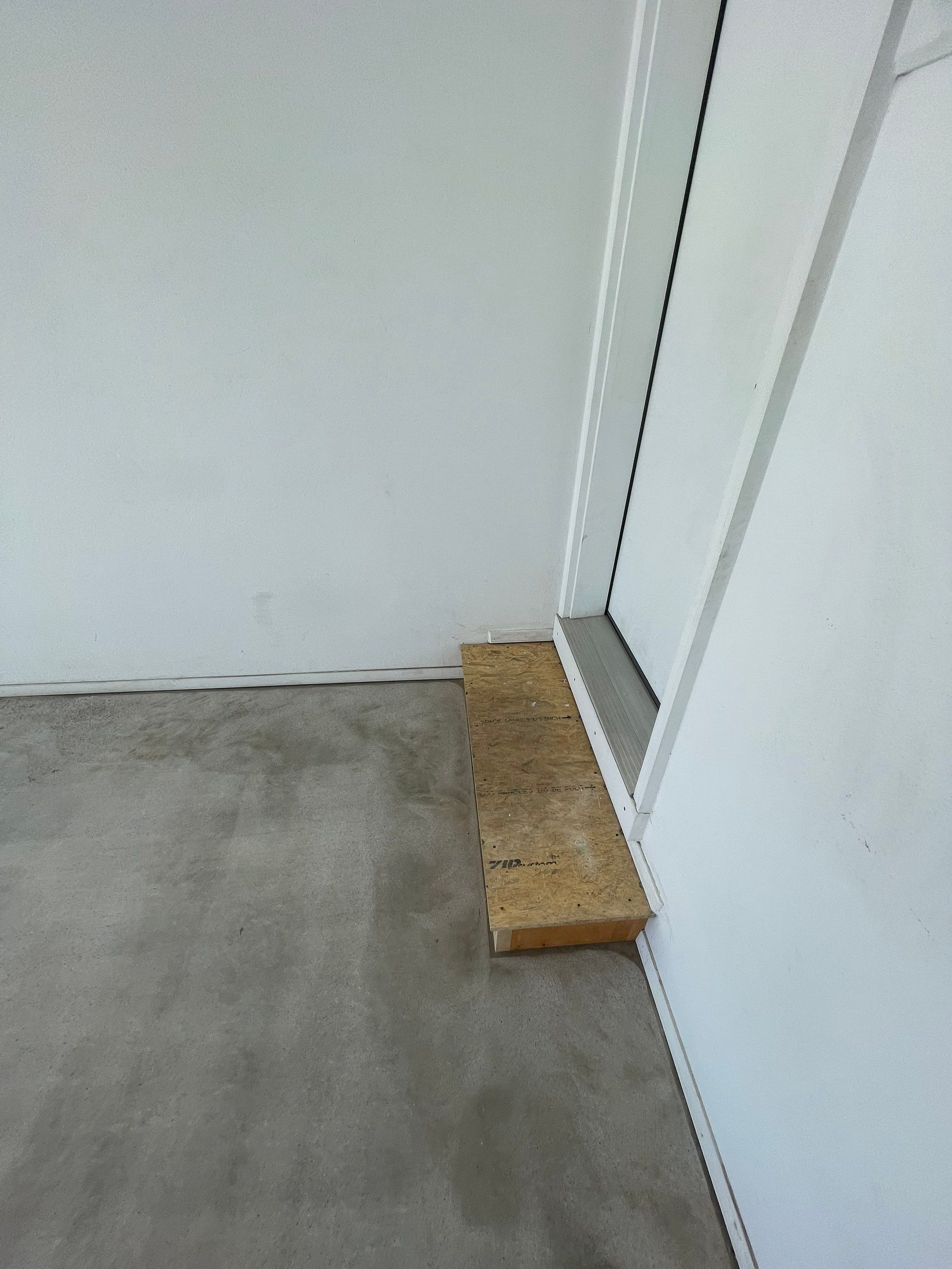 Yankton Garage Floor Restoration with Gray Speckled Epoxy Coating by Select Painting, Coatings & Garage Cabinets