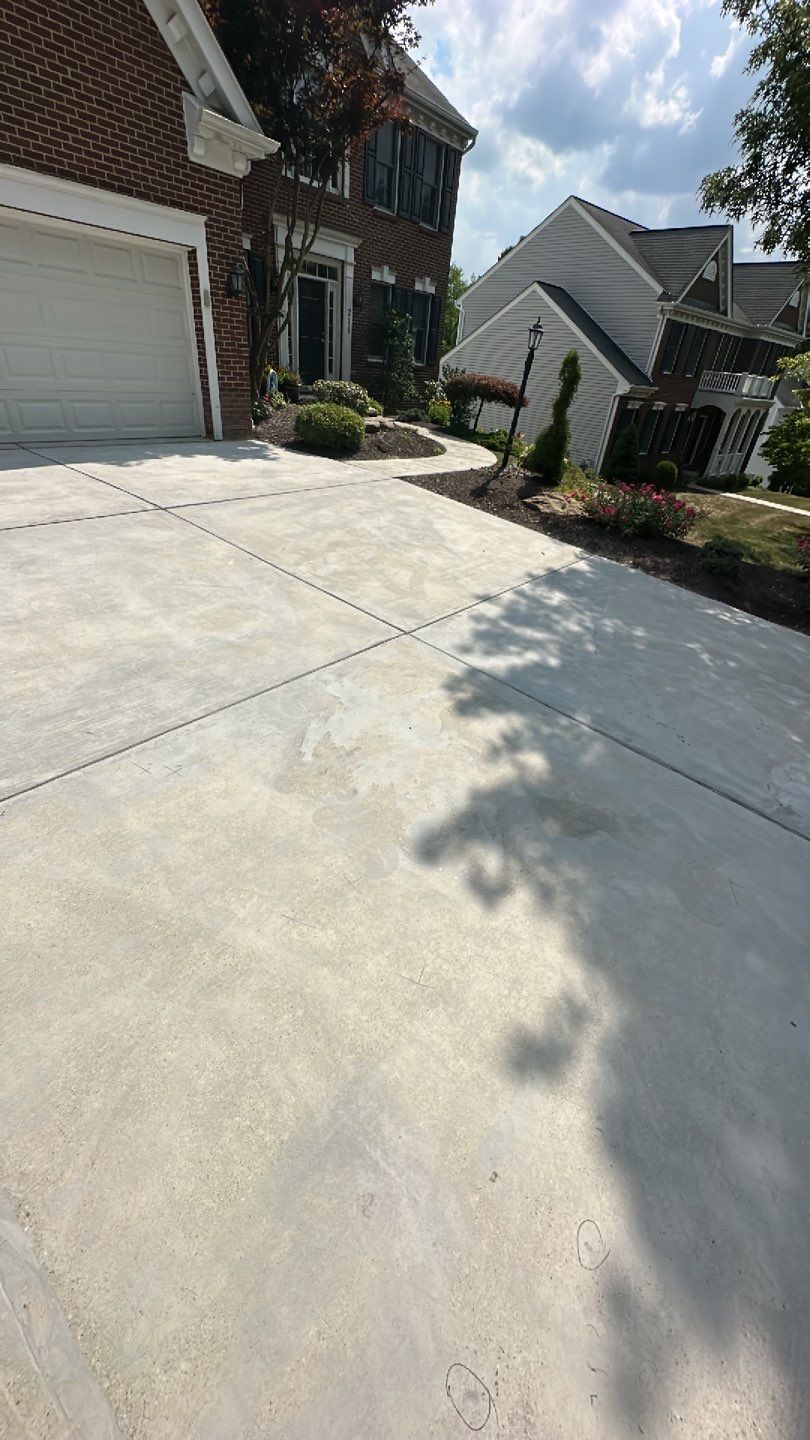 Pool Deck + Driveway + Garage Project in Venetia by Floors in a Day, Inc