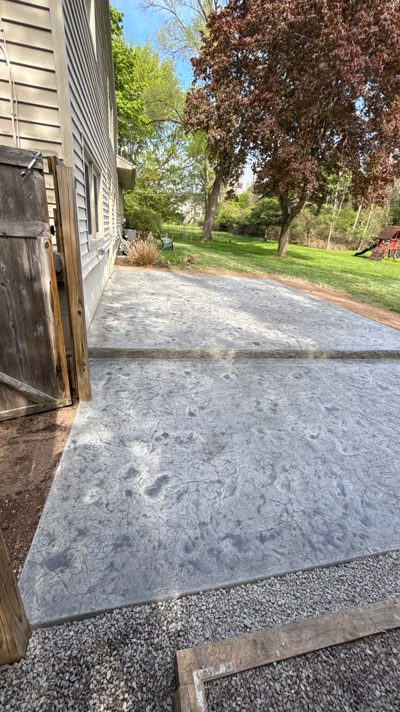 Oxford Slate Two Tiered Patio by NG Masonry & Construction LLC