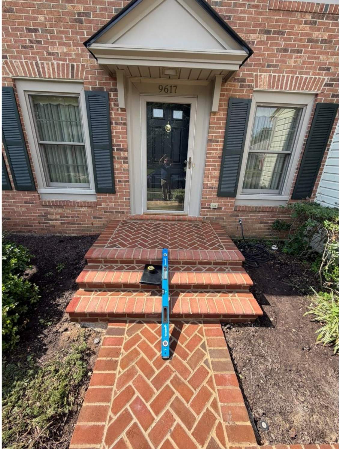 Custom Exterior Handrail Installation on Brick Entryway in Fairfax Station by Capitol Iron Works