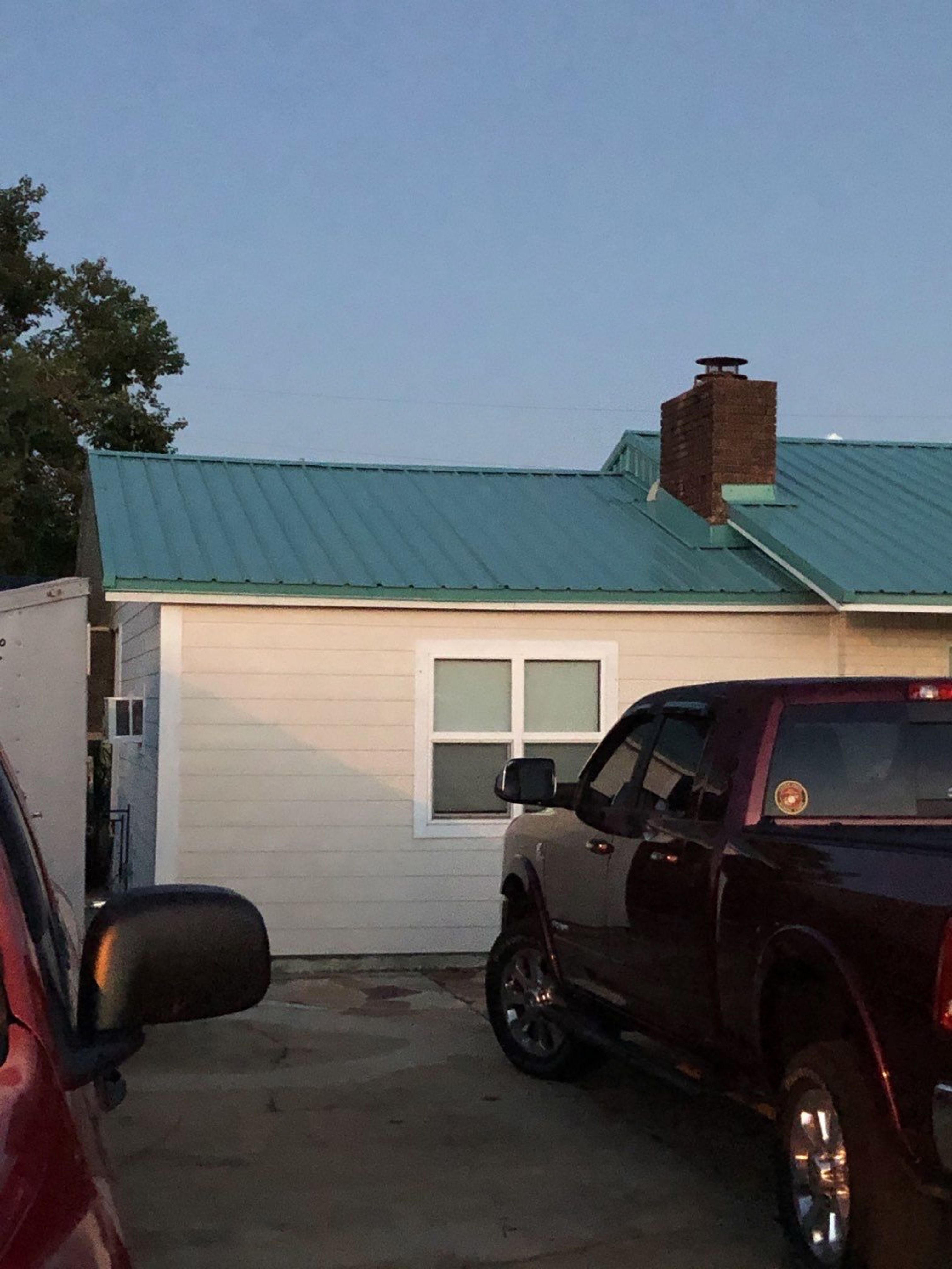 Gutter Installation using K-Style White Seamless Gutters by Gutter Professors