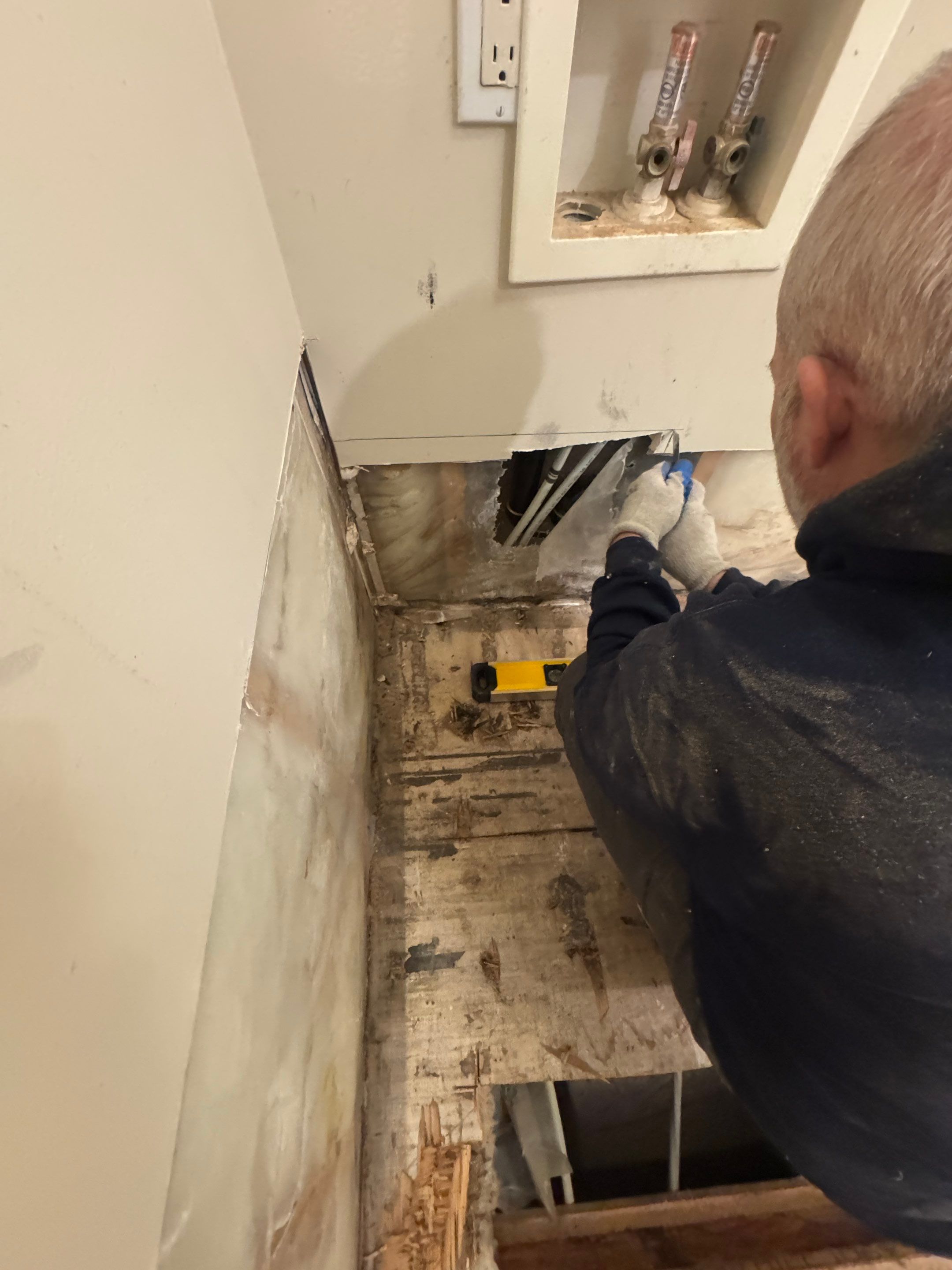 High-End Laundry Room Renovation and Restoration in Vancouver by YVR Construction Group