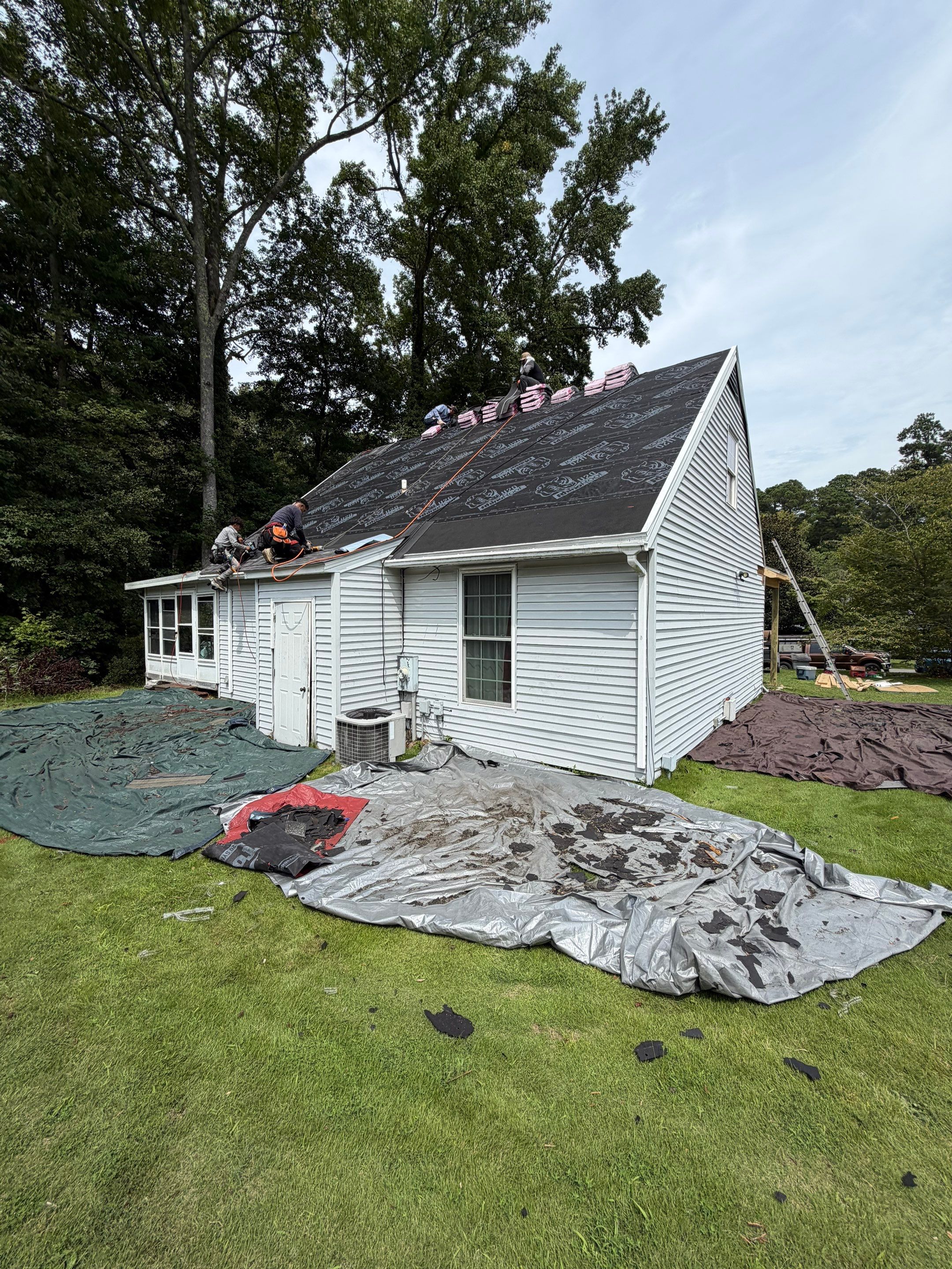 Asphalt Shingle Roof Replacement and Custom Porch Renovation in Hayes by Cade Construction