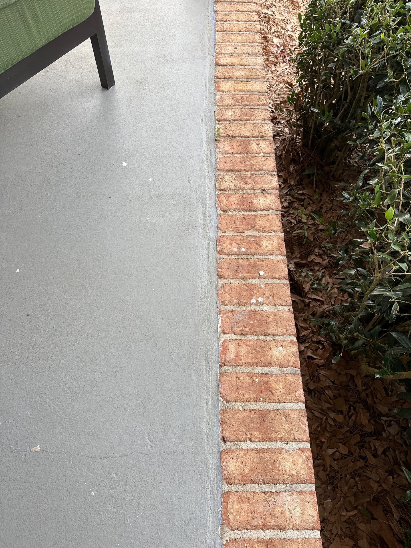 Wood-Grain Stenciled Concrete Porch Resurfacing in Mobile by Cornerstone Hard Surface Restoration 