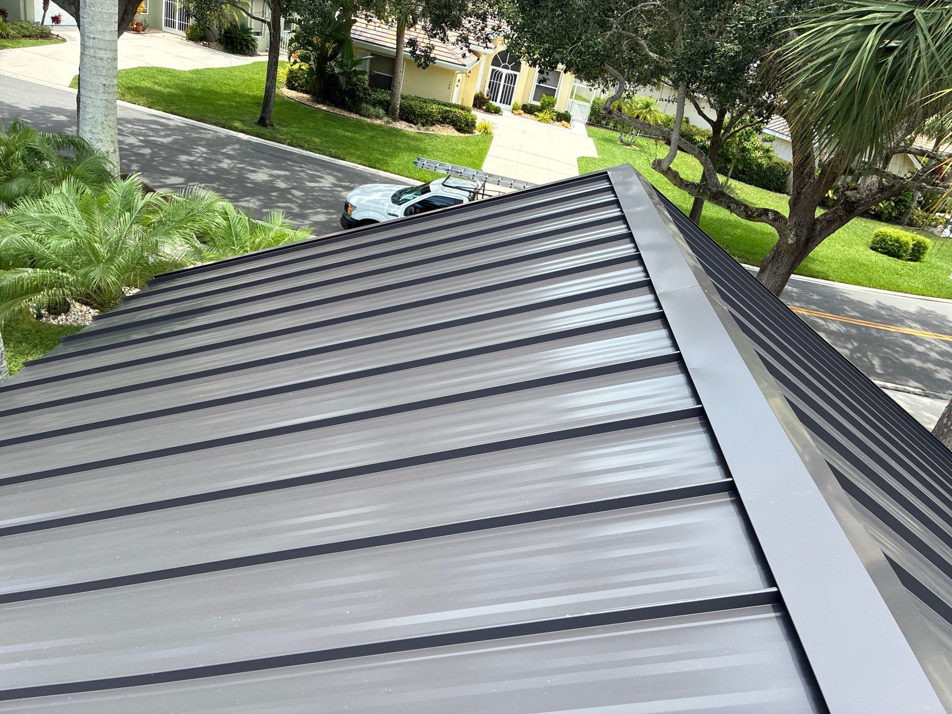 24ga 1.5" Mechanical Seam Dark Bronze by Total Roofing System The Metal Roof Experts
