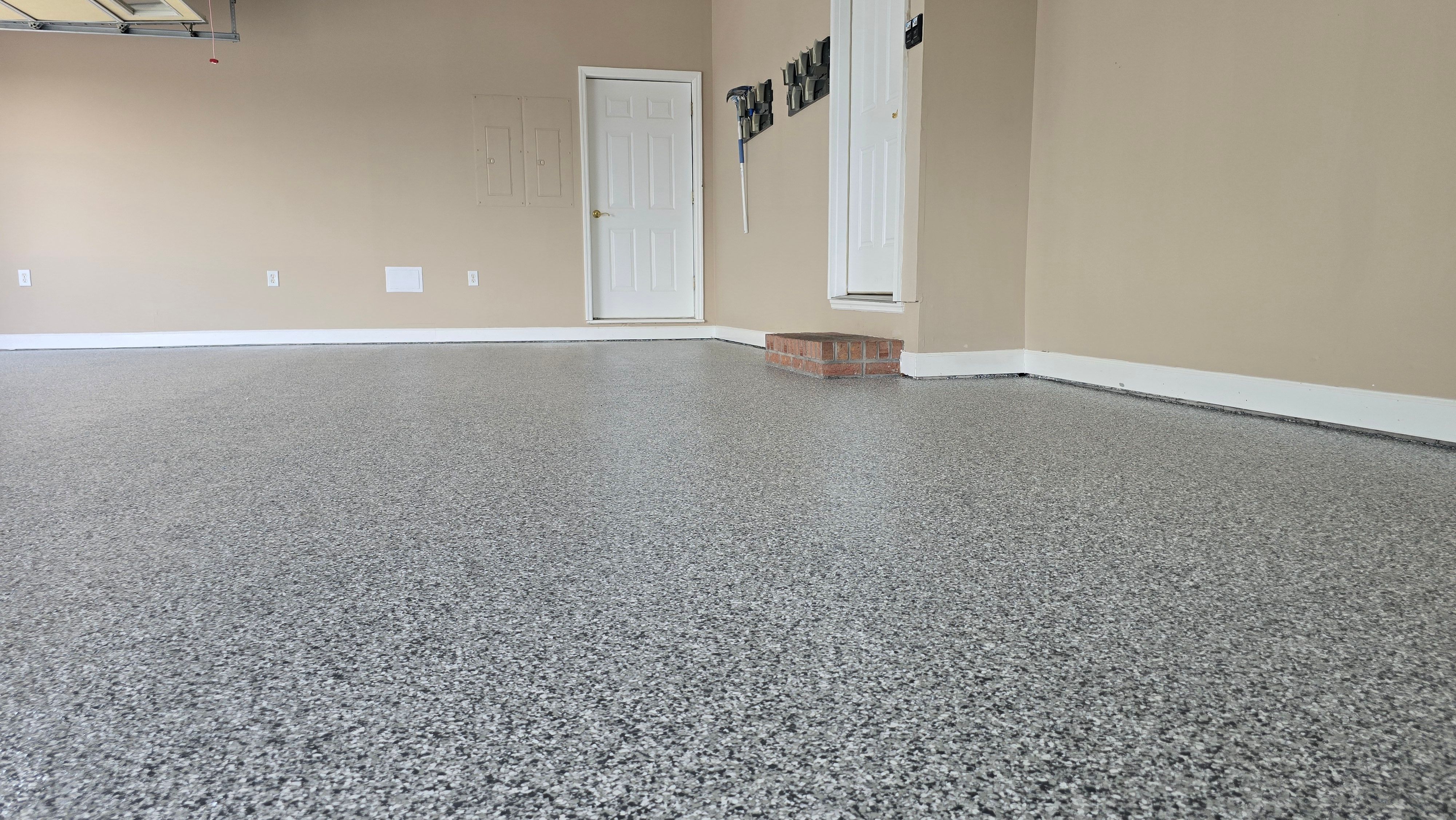Garage using Gravel by Elite Floor Solutions