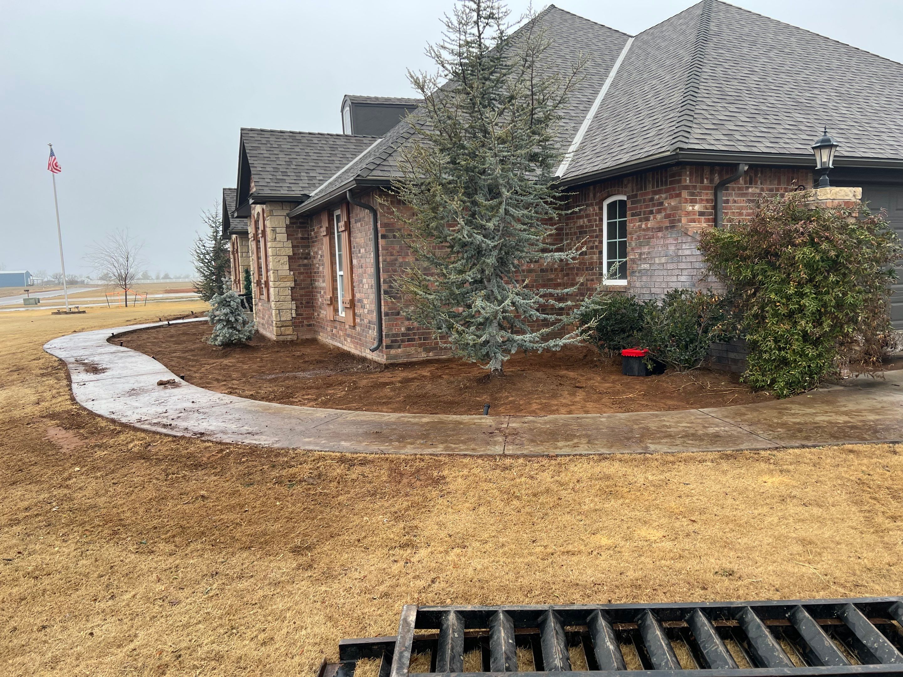 Landscape installation w/ irrigation and landscape lighting by Clays Services Inc