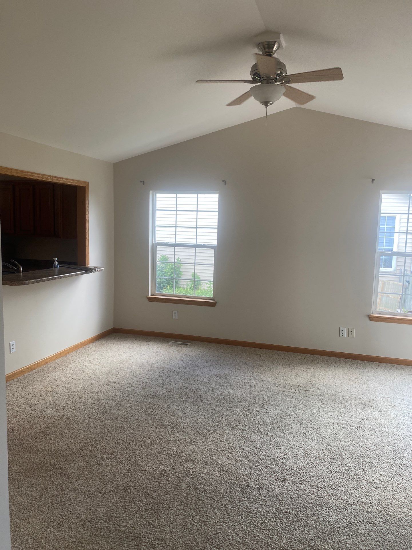 Living Room Wallpaper Removal and Interior Painting by OCS Contracting Services
