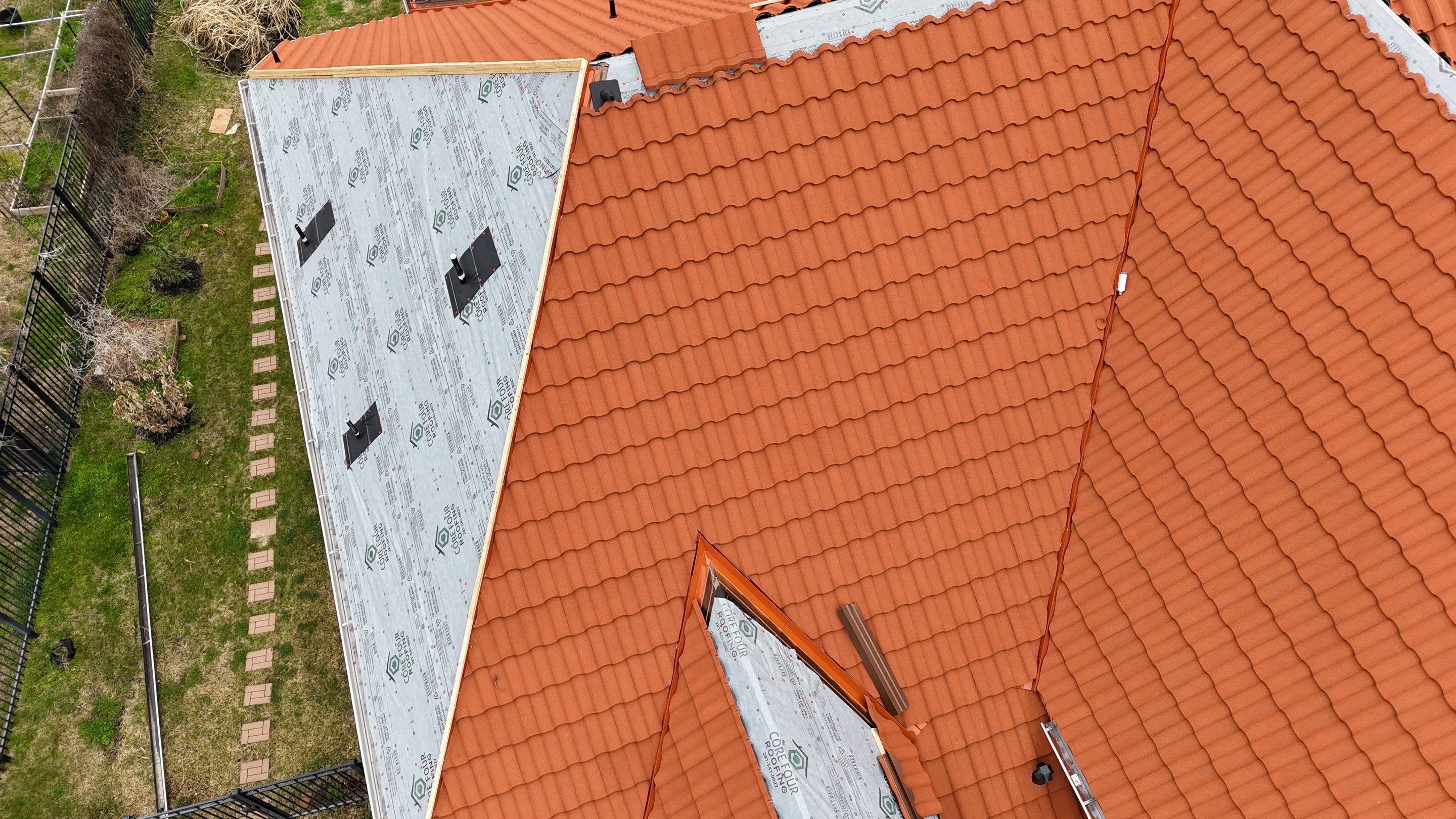 Stunning transformation using DECRA Villa Tile! by Core Four Roofing