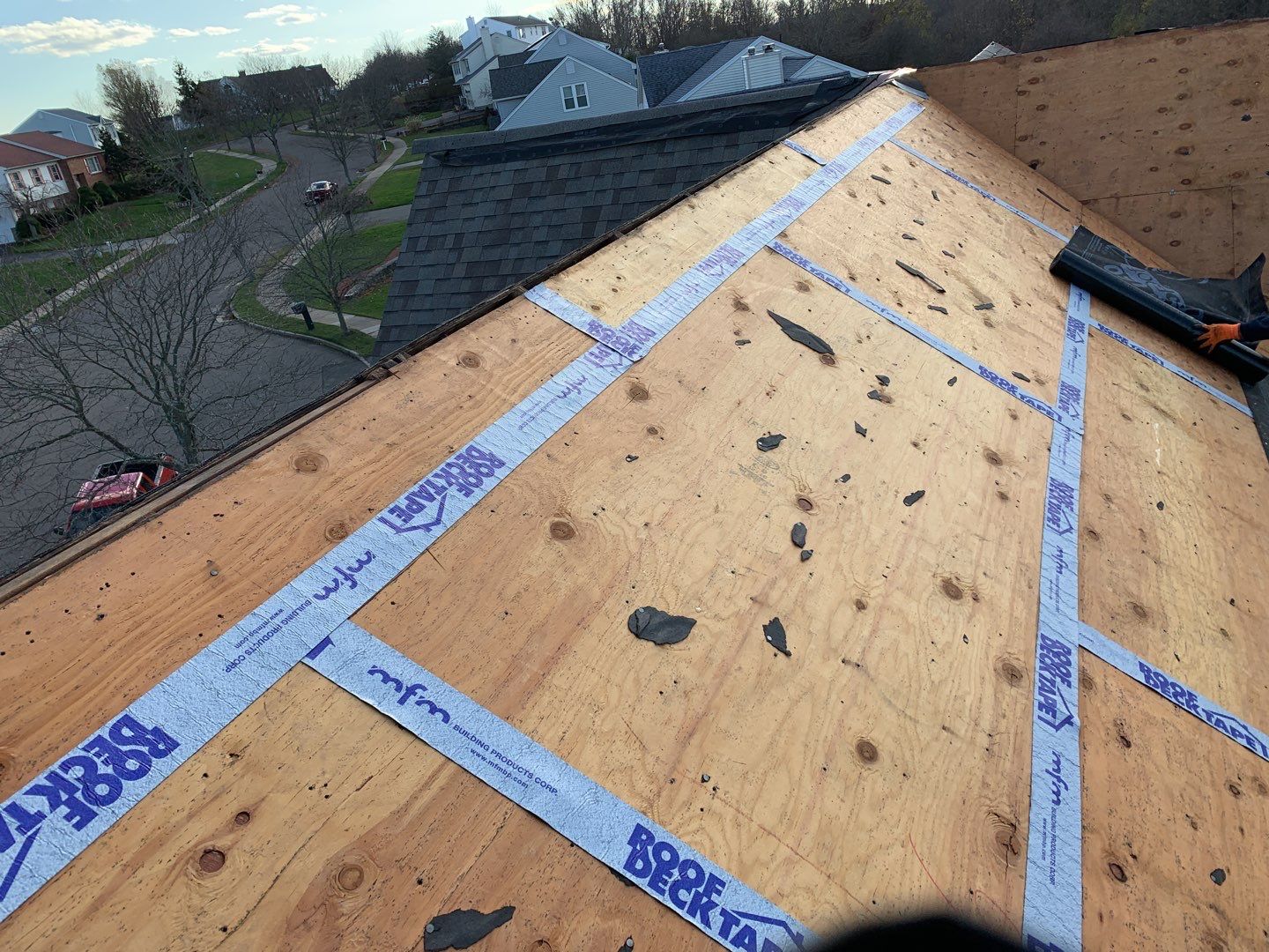Commercial Roofing Installation using Owens Corning TruDefinition driftwood by A Plus Exterior