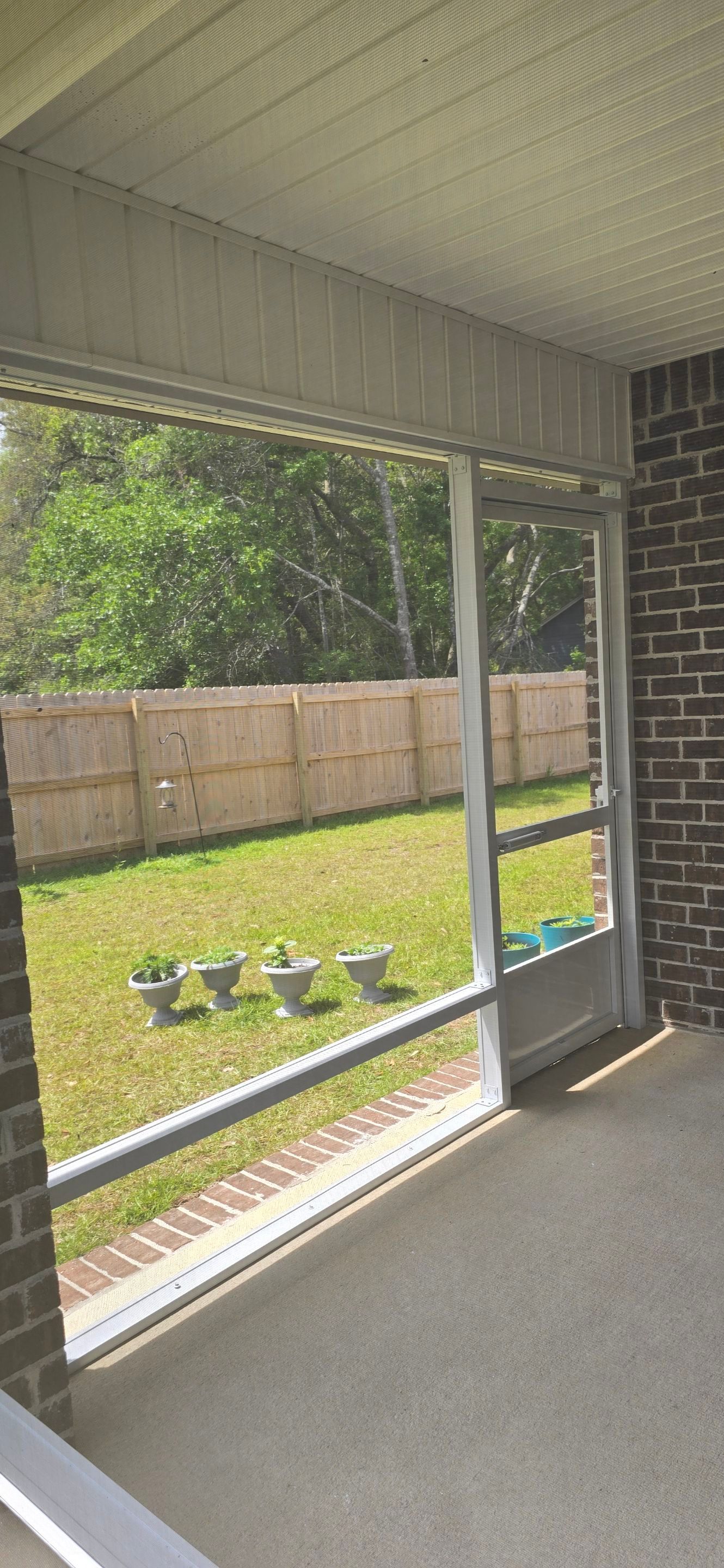 Screen Room Under Existing Roof in Milton by Titan Sunrooms