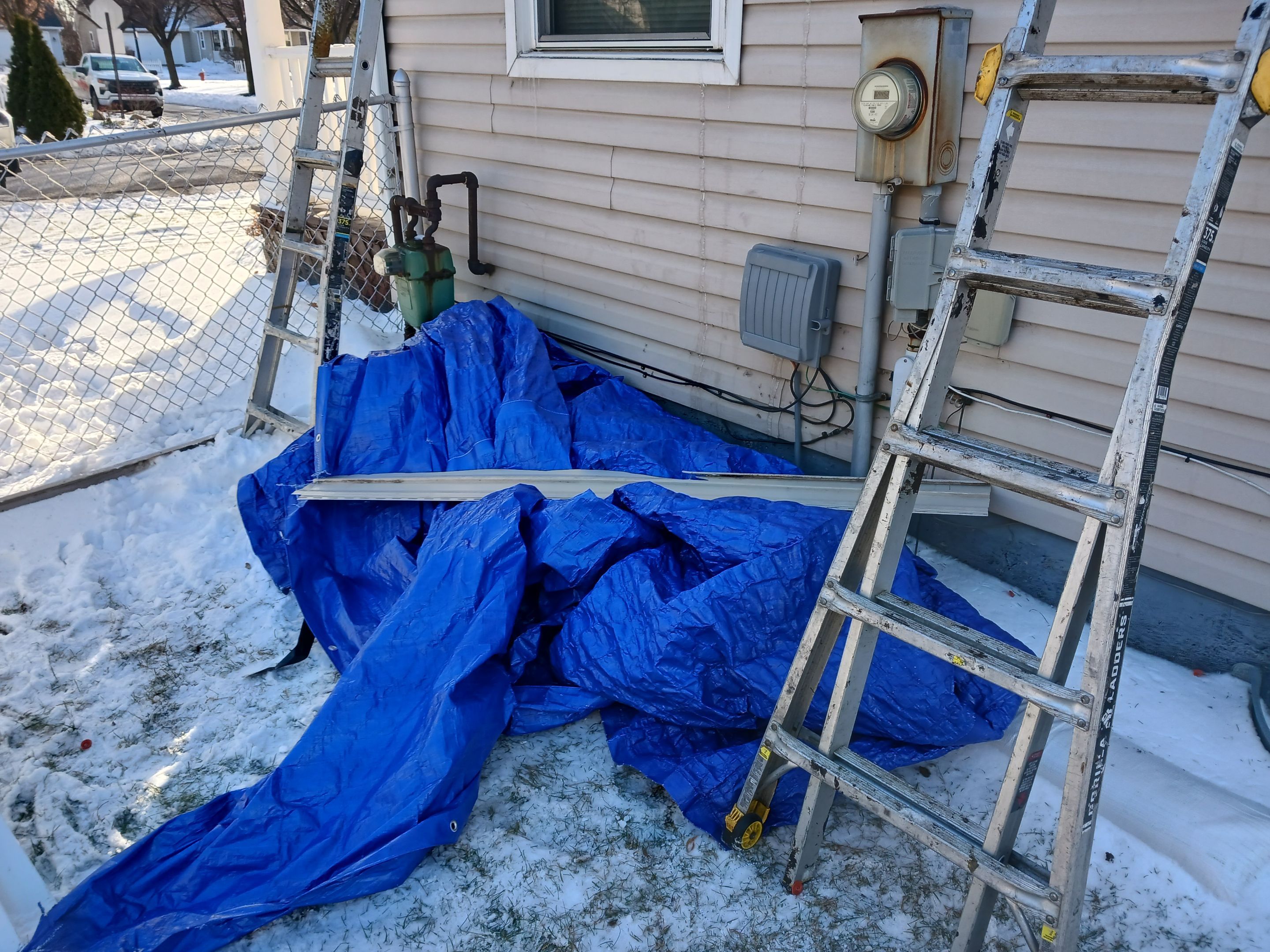 Wind damage to Siding: Insurance paid for full replacement of all siding by Absolute Roofing and Construction