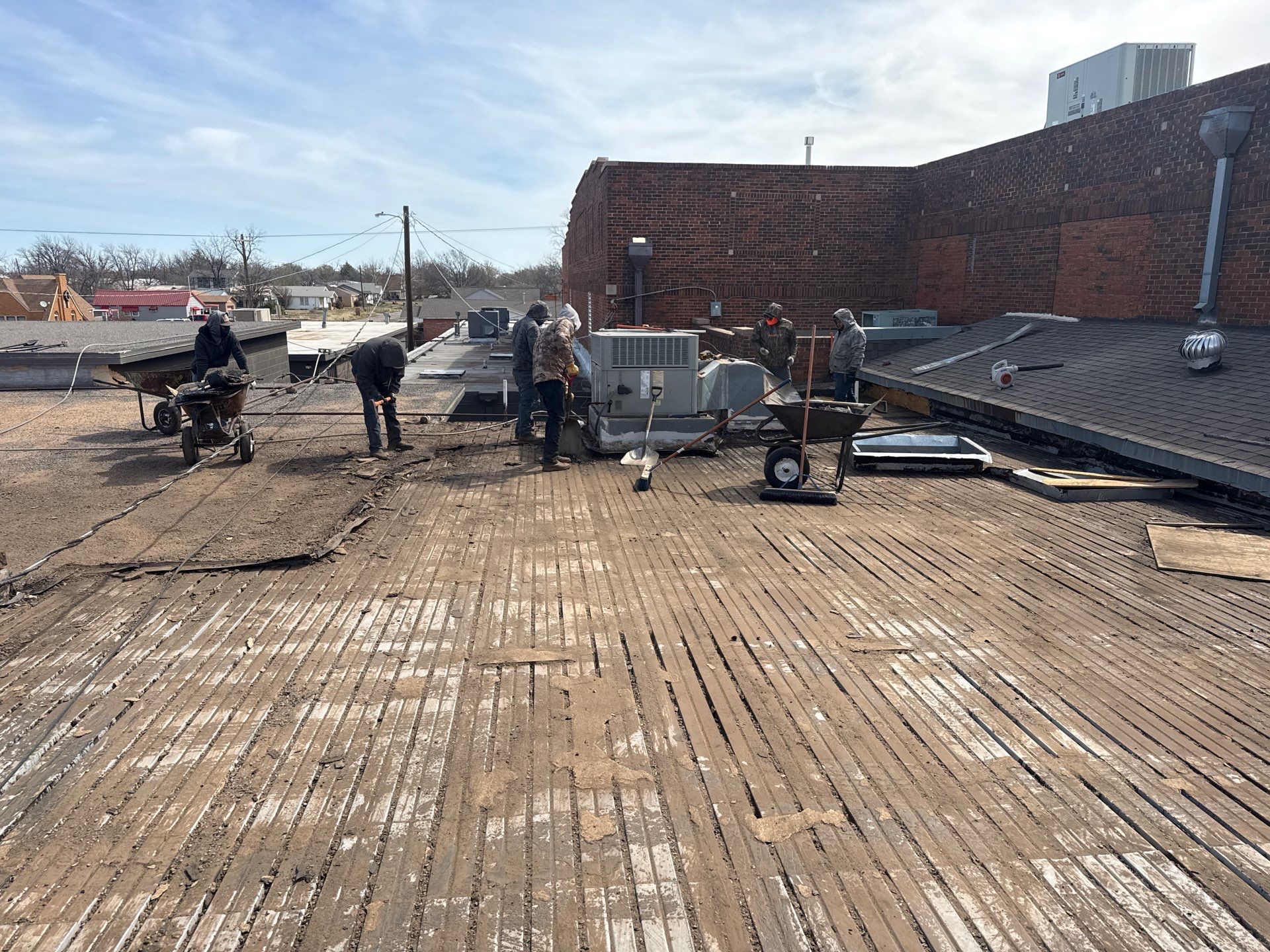 Hollis High School Comprehensive TPO Roof Replacement and Restoration by Secondary Rhodes