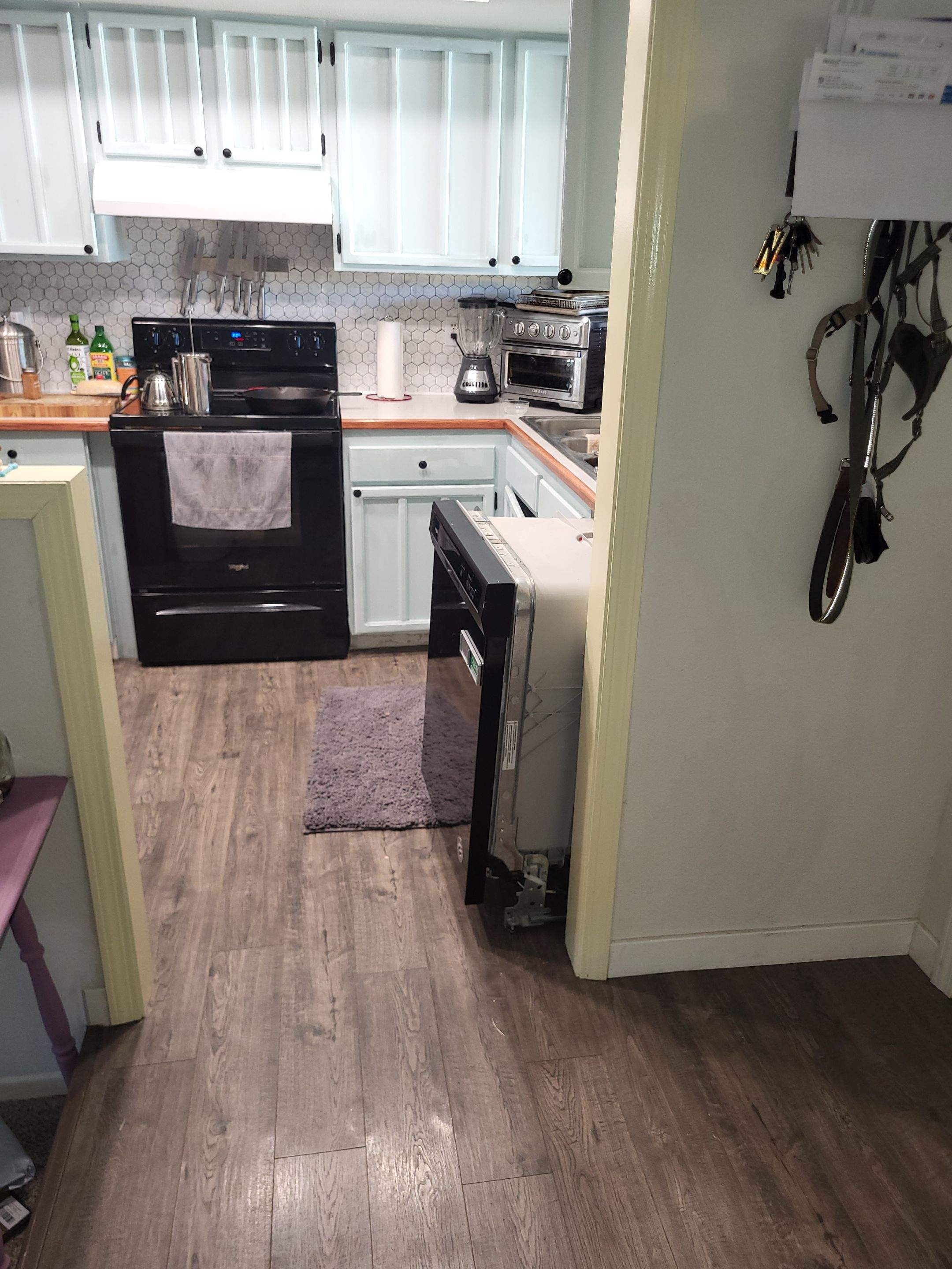 Vancouver Kitchen Renovation Featuring Tile Backsplash and Farmhouse Sink by American Made Construction 