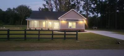 New Home Construction using brick and vertical vinyl  