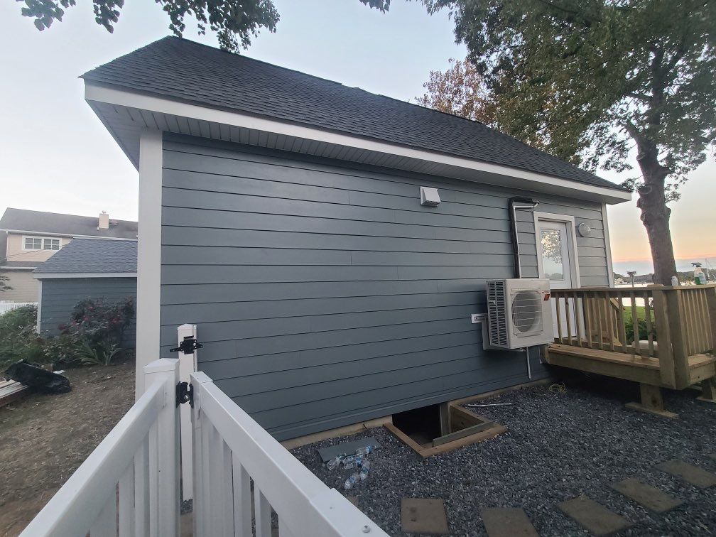 Siding Installation using JH Batten Smooth, JH Smooth Plank STMT, and JH Panel Smooth by ExteriorPros