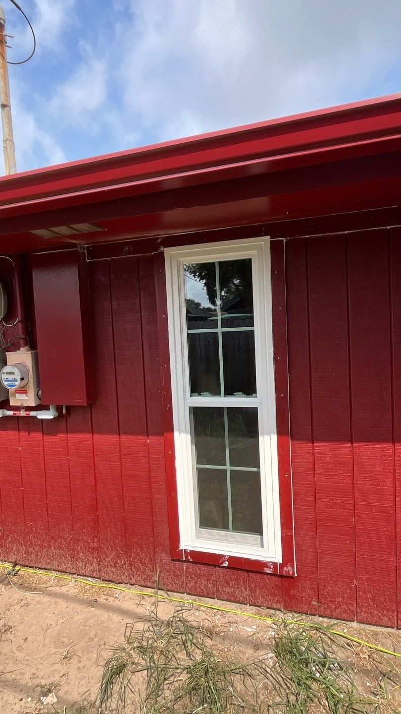 Black and white and red all over by Bayfront Roofing and Construction