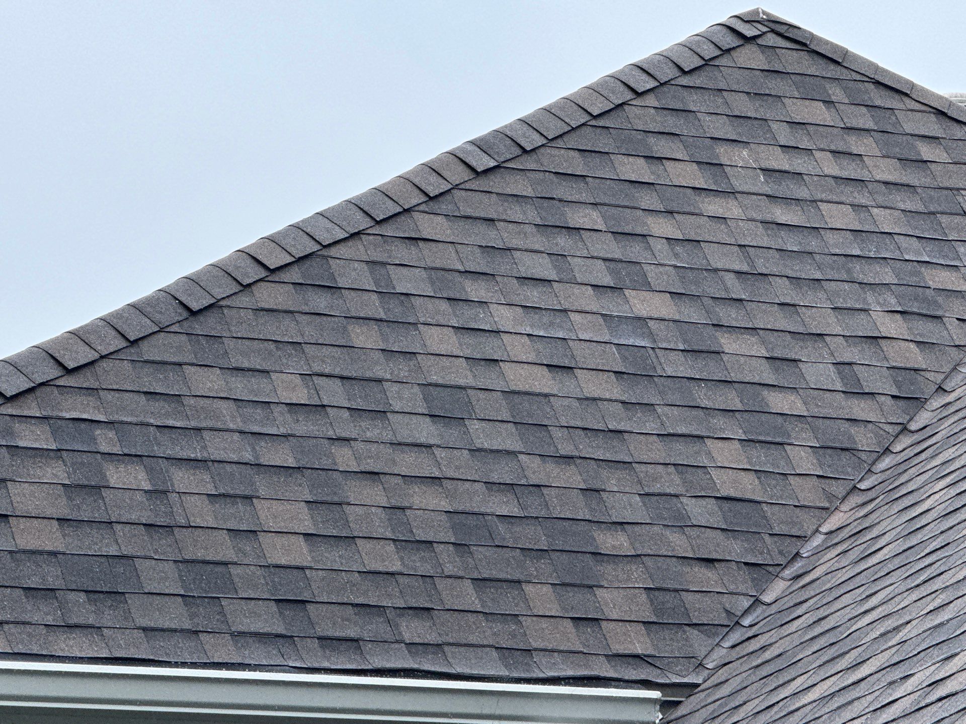 Complete Kansas City Exterior Remodel With IKO Roofing and Craneboard Siding by EEC Windows, Siding & Roofing
