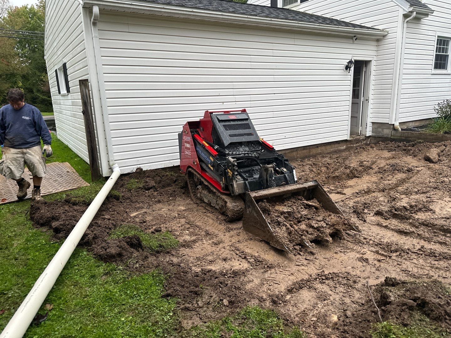 Majestic Ashlar stamped concrete patio with a border  by NG Masonry & Construction LLC