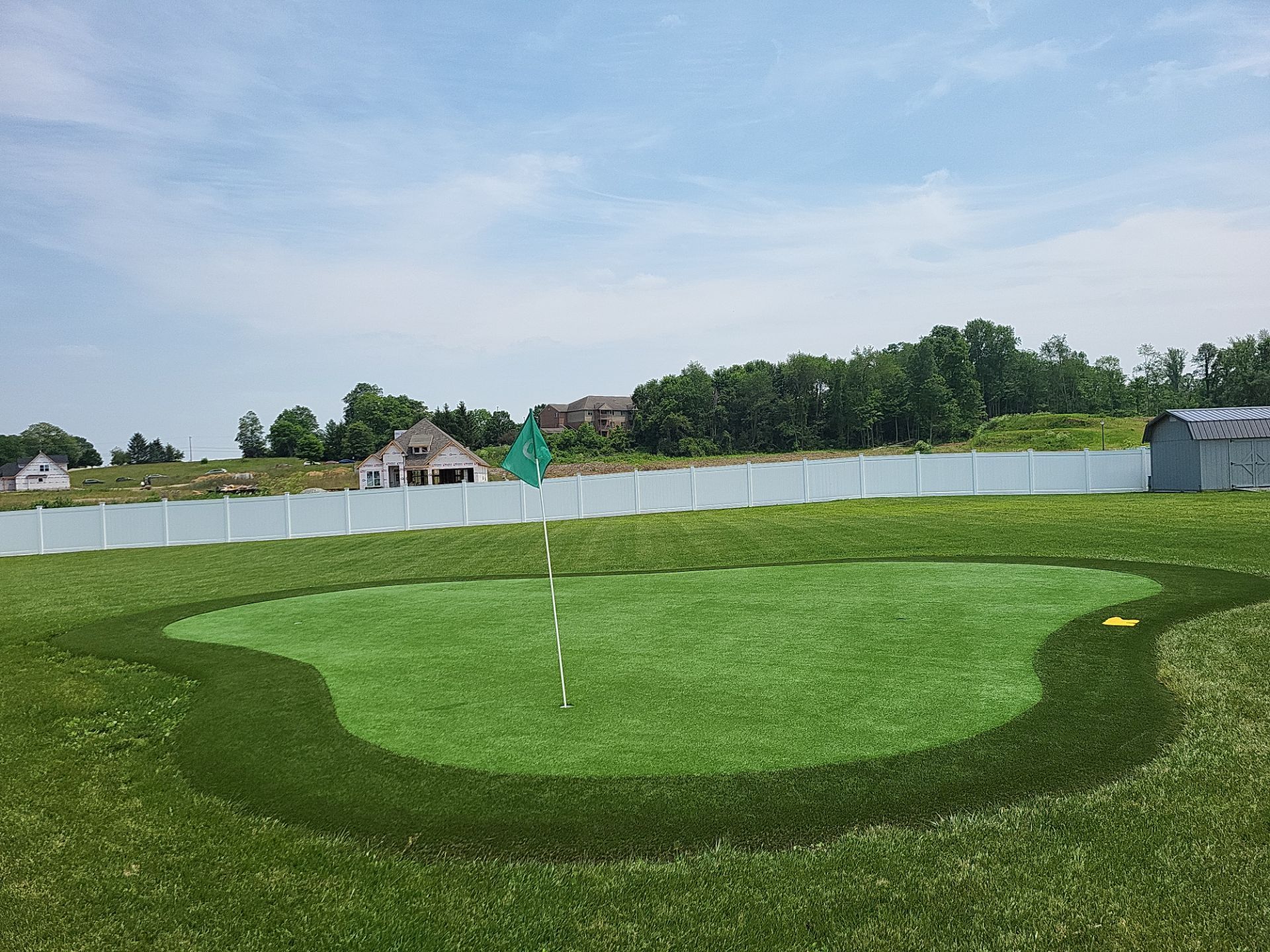 Custom Residential Synthetic Putting Green Installation in Xenia, Ohio by Southwest Greens Midwest